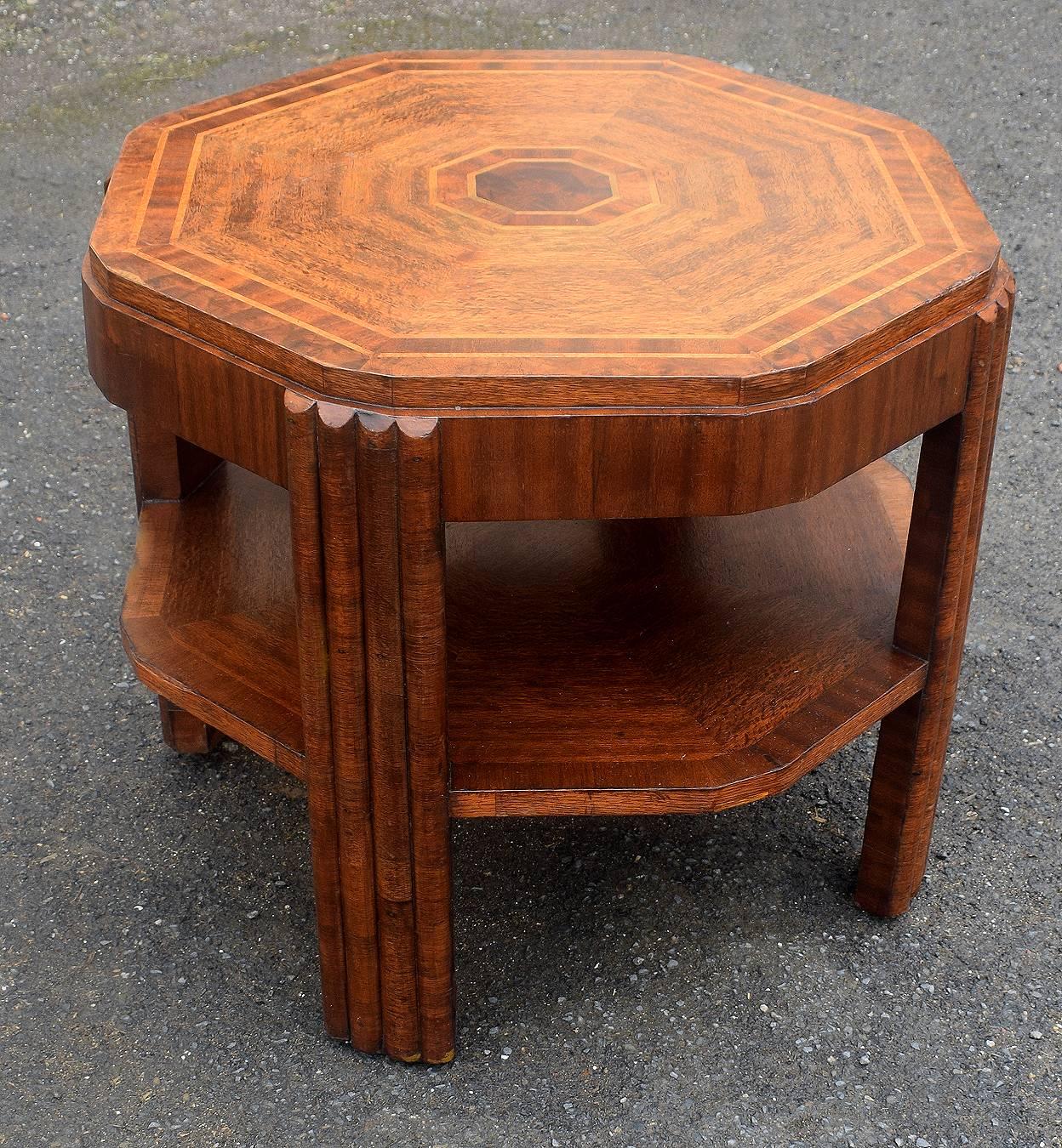 Very stylish Art Deco English table dating to the 1930s. A very fine example that can be used for multiple purposes, a centre, end, book, coffee table. An innovative design sets this Art Deco occasional or book table apart from run of the mill.