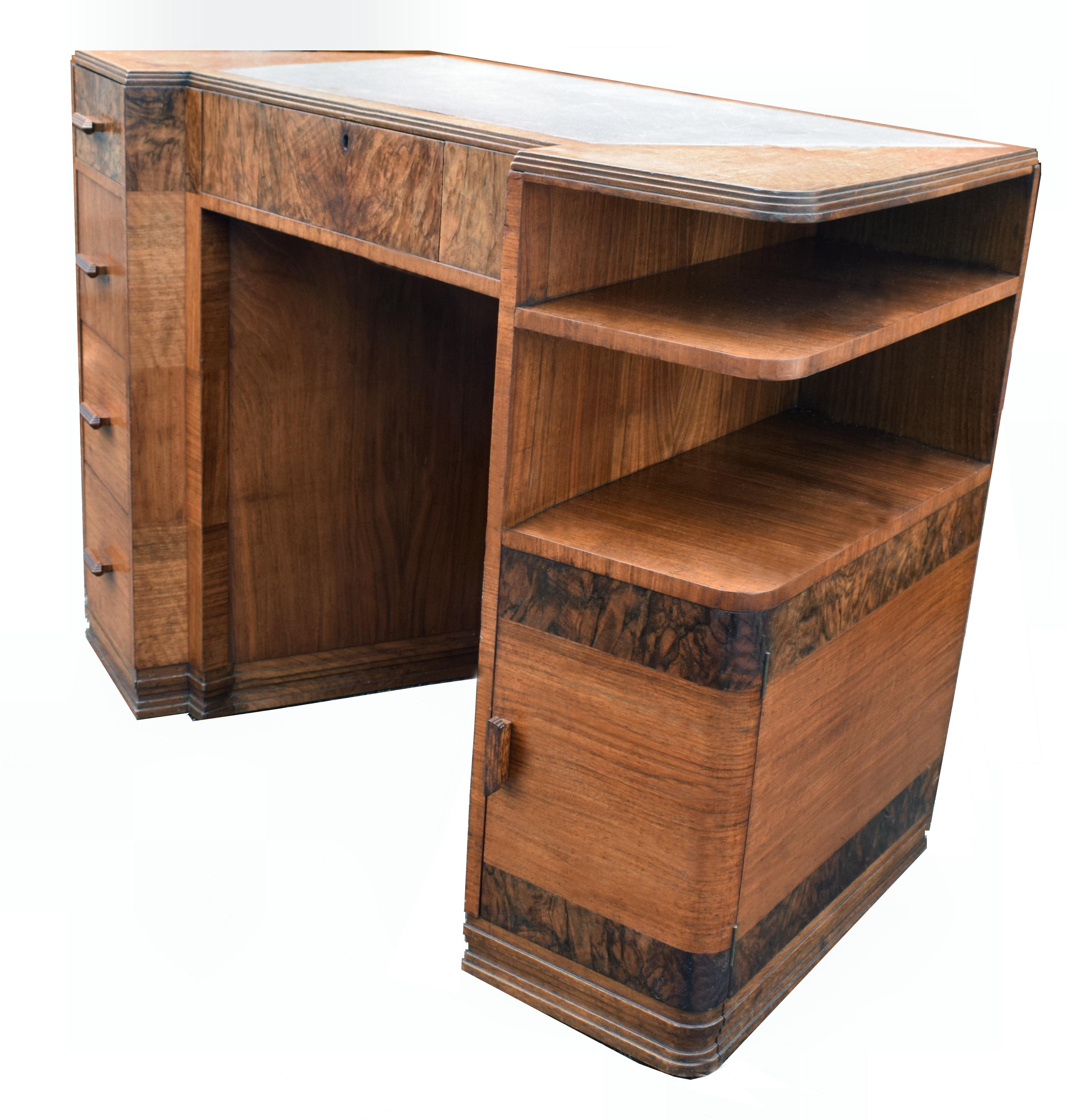 For your consideration is this fabulous 1930s Art Deco center desk. This desk is designed so that you can have it room center as it's veneered on the back rather than the normal run of the mill desks. Really attractive design with four drawers to