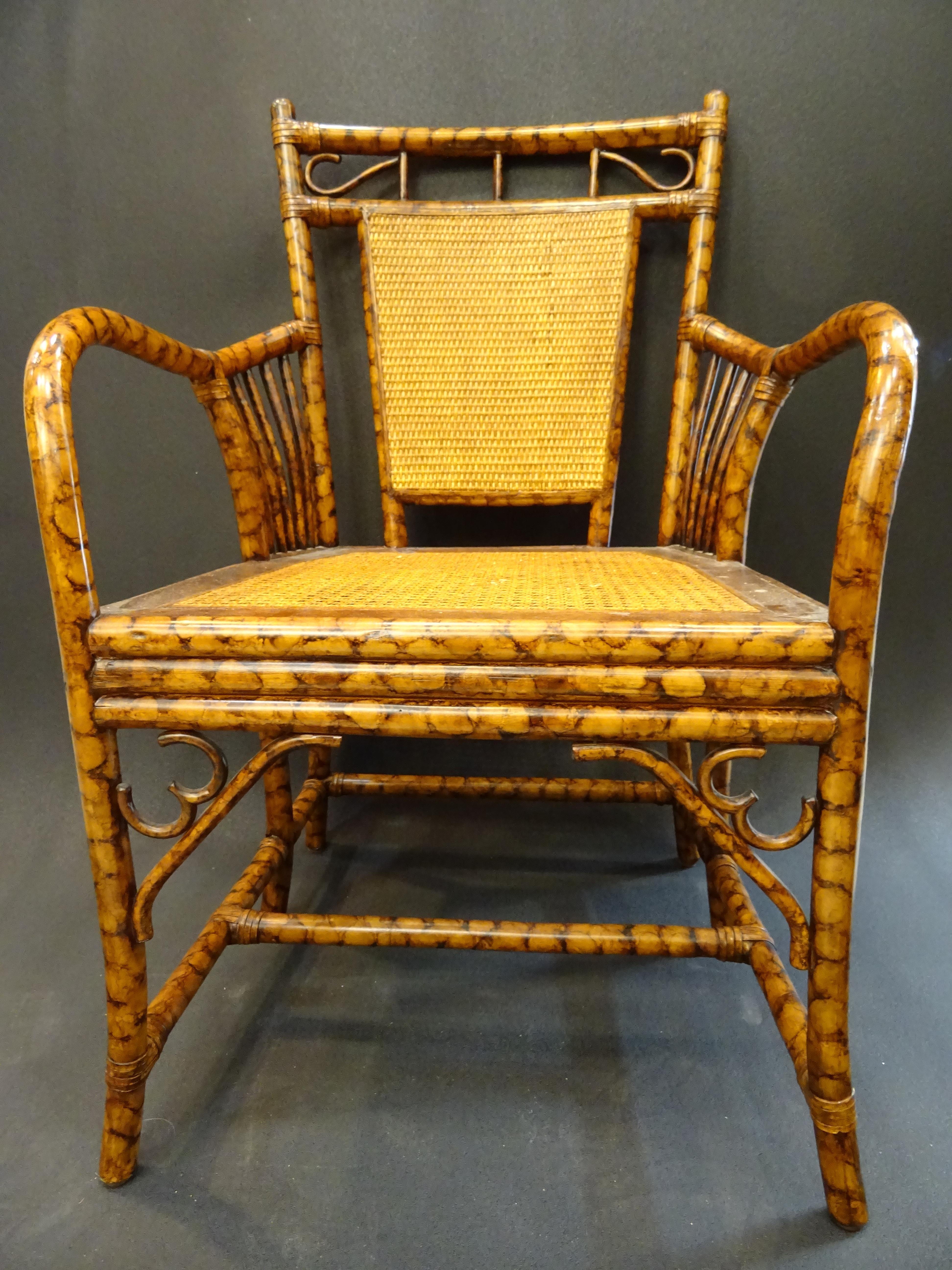 Stunning and lovely English Arts & Crafts armchair, in bamboo simulating root wood and rattan. In a very good condition with age and use.
It was purchased in a private collection in Geneva Switzerland.
Its a very cozy piece to put in a closed