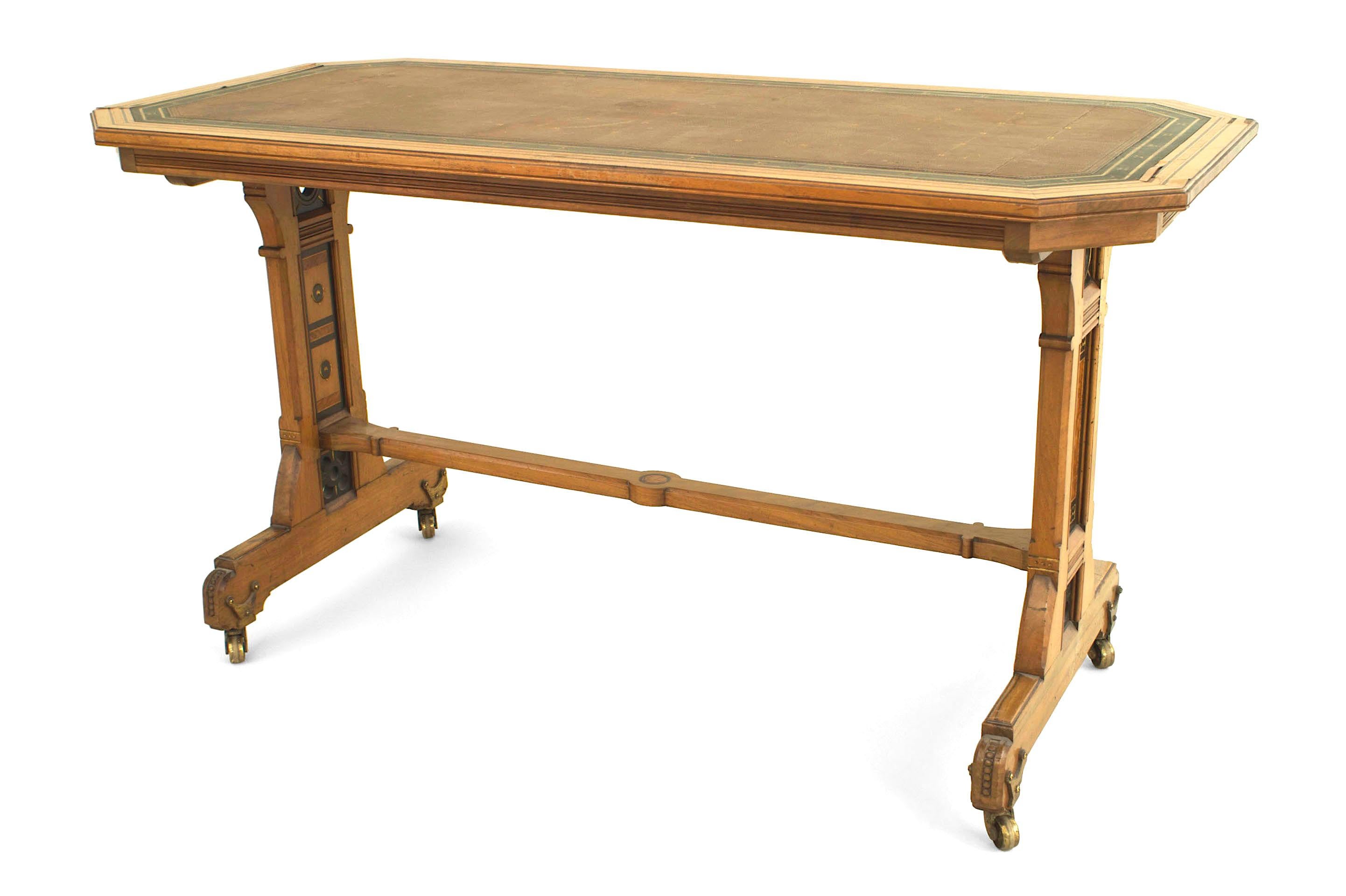 English Arts & Crafts (Aesthetic Movement) double pedestal table elm and burl wood desk with a canted corner top having multi-wood inlay and a green & brown leather writing surface.
    