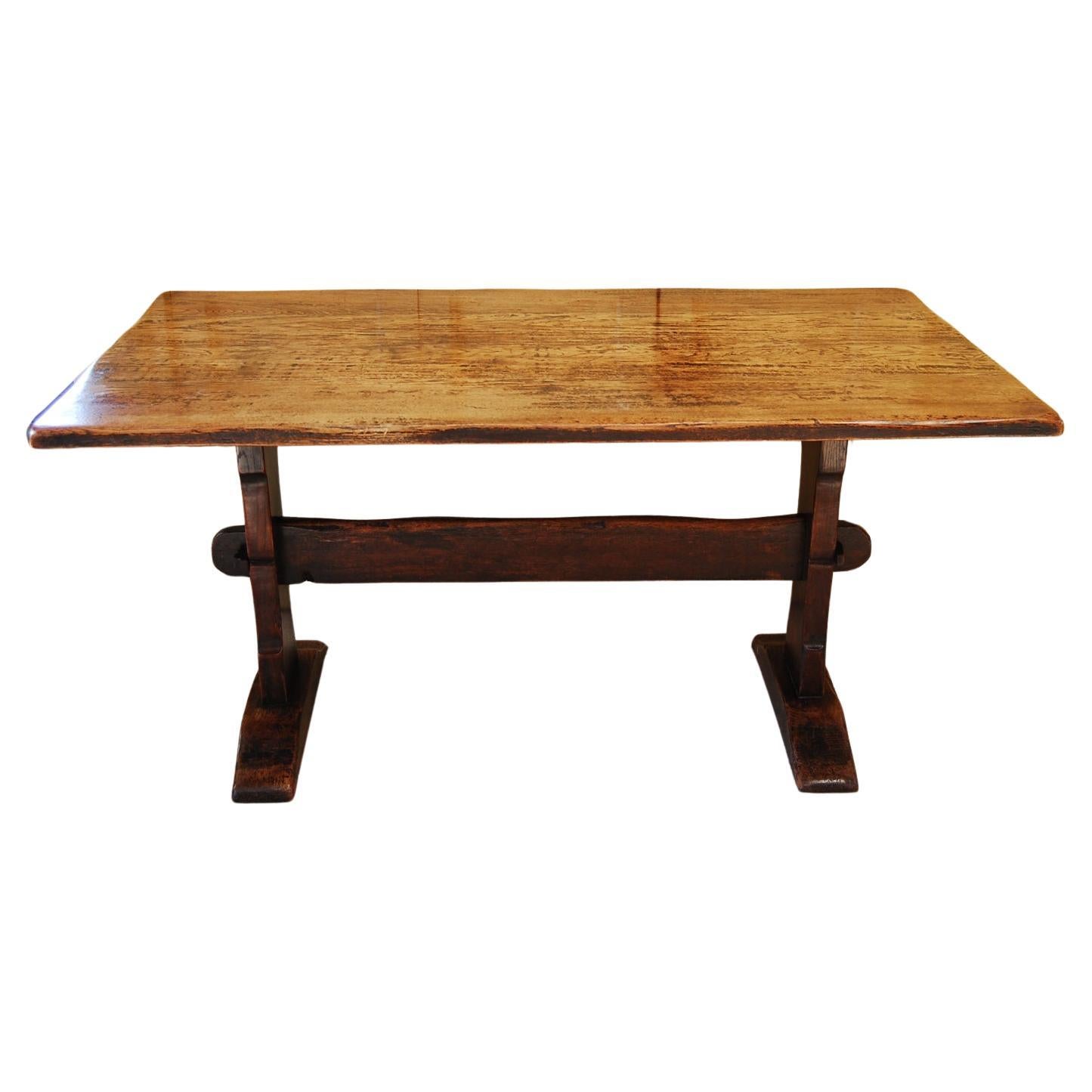 English Arts and Crafts Oak Farmhouse Table with Trestle Base and Plank Top For Sale