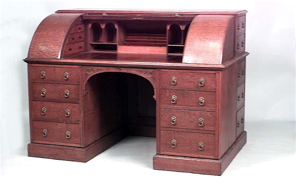 Englischer Rollentisch aus Eiche im Arts and Crafts-Stil mit seitlichen Schubladen und Lederplatte.
