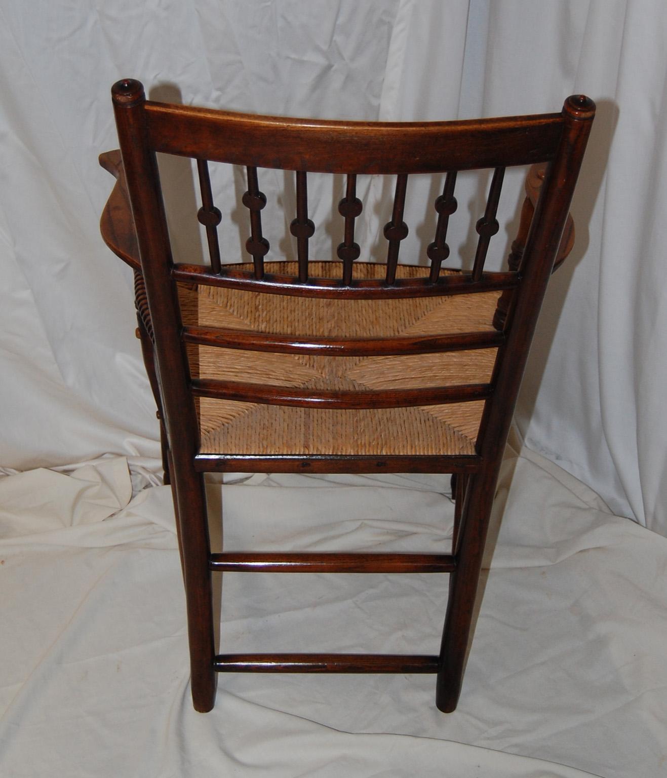 English Arts and Crafts Period Spindle Back Rush Seated  Elm Armchair In Good Condition For Sale In Wells, ME