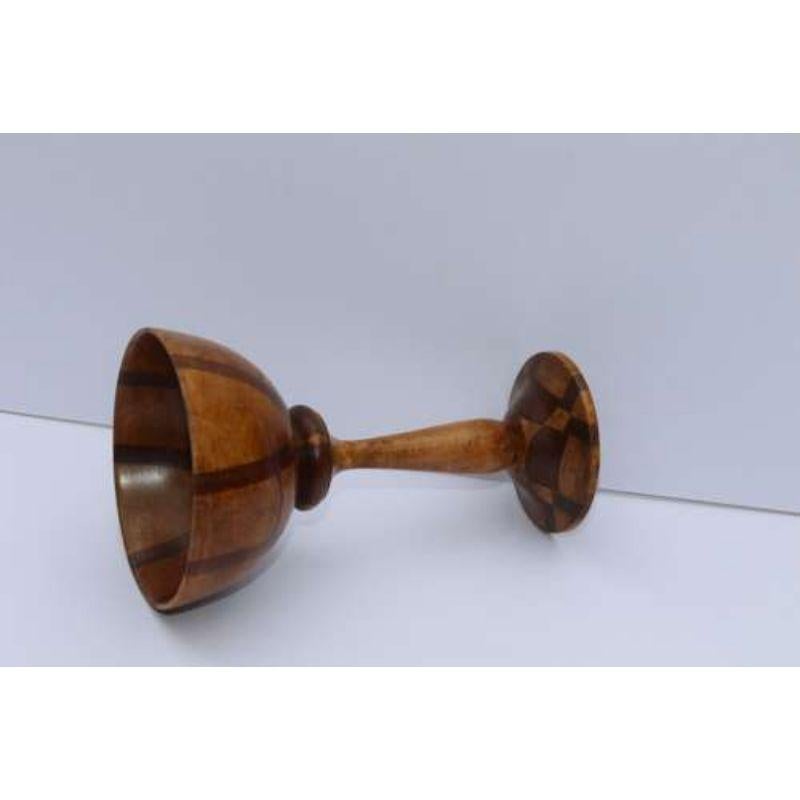 A very fine English Arts and Crafts treen specimen wood turned goblet

This superb English Arts and Crafts turned goblet is signed on the underside J Hill and dated 1909. It is made from multiple layers of different cut timbers which have been