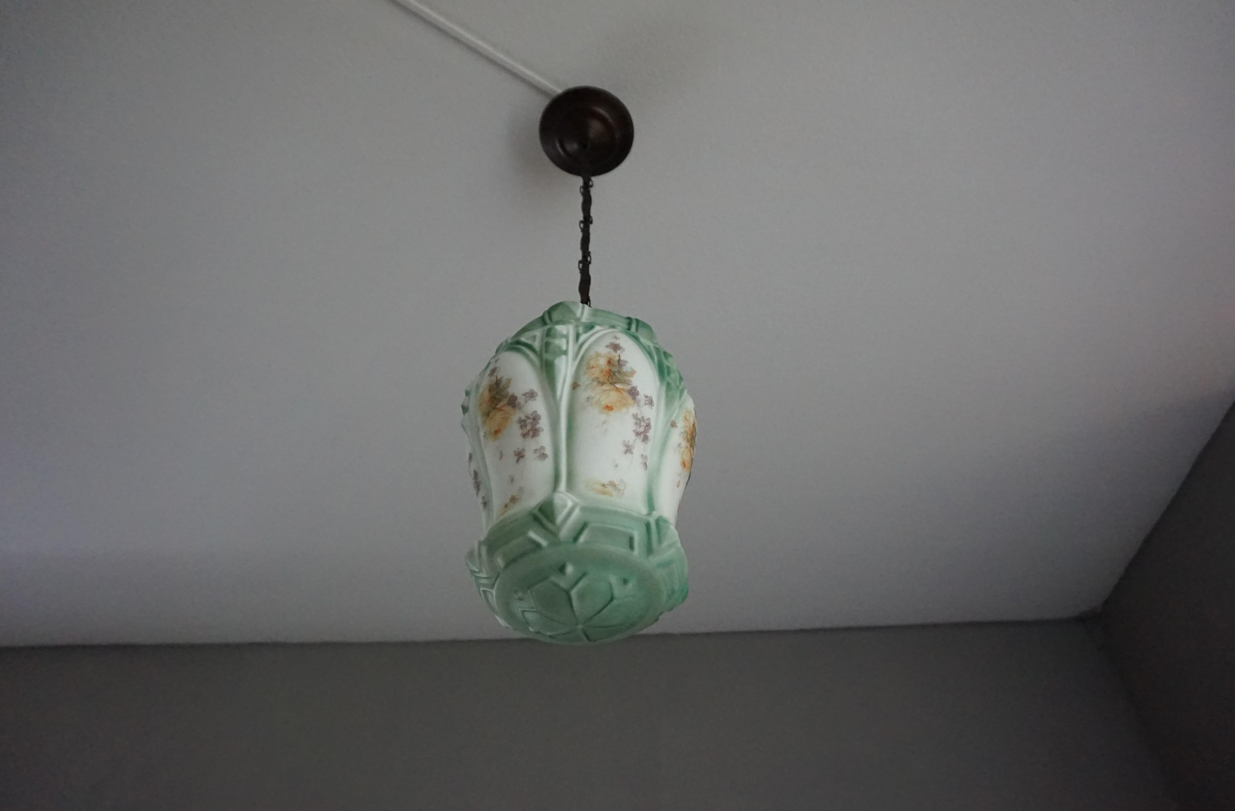 Beautiful shape, colorful and excellent condition chandelier.

If you are looking for a rare and decorative light fixture that is stylish and quality-made at the same time then this fine pendant could be flying your way soon. This all-original and