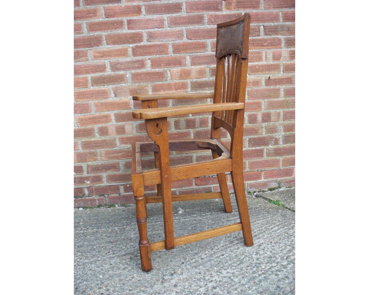 Arts and Crafts English Arts & Crafts Oak Dining Chair with Stylised Floral Cut-Outs to the Arms For Sale