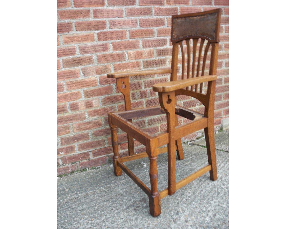Hand-Crafted English Arts & Crafts Oak Dining Chair with Stylised Floral Cut-Outs to the Arms For Sale