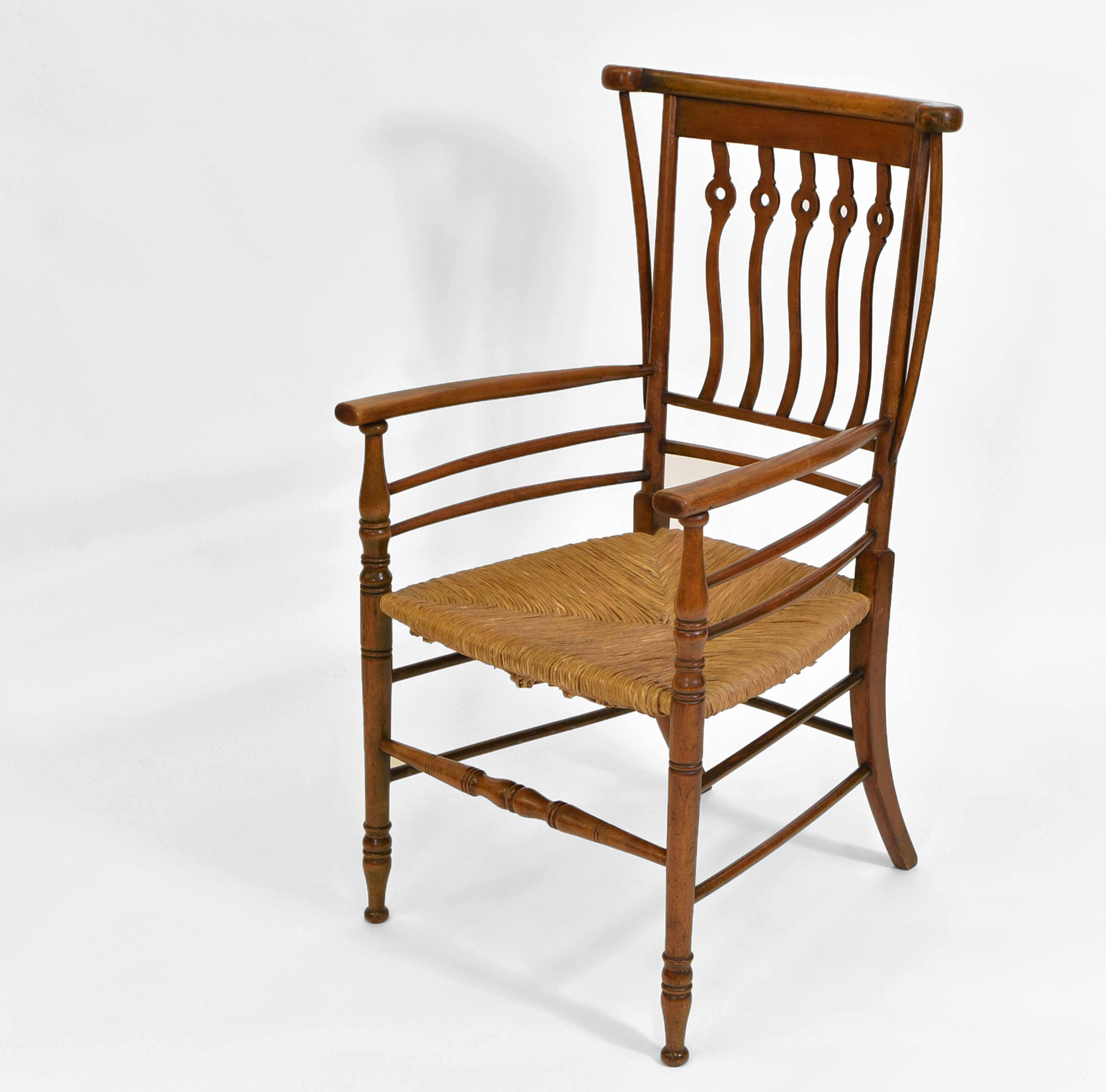 English Arts & Crafts “Quaint” Rush Seated Armchair In Good Condition For Sale In Norwich, GB