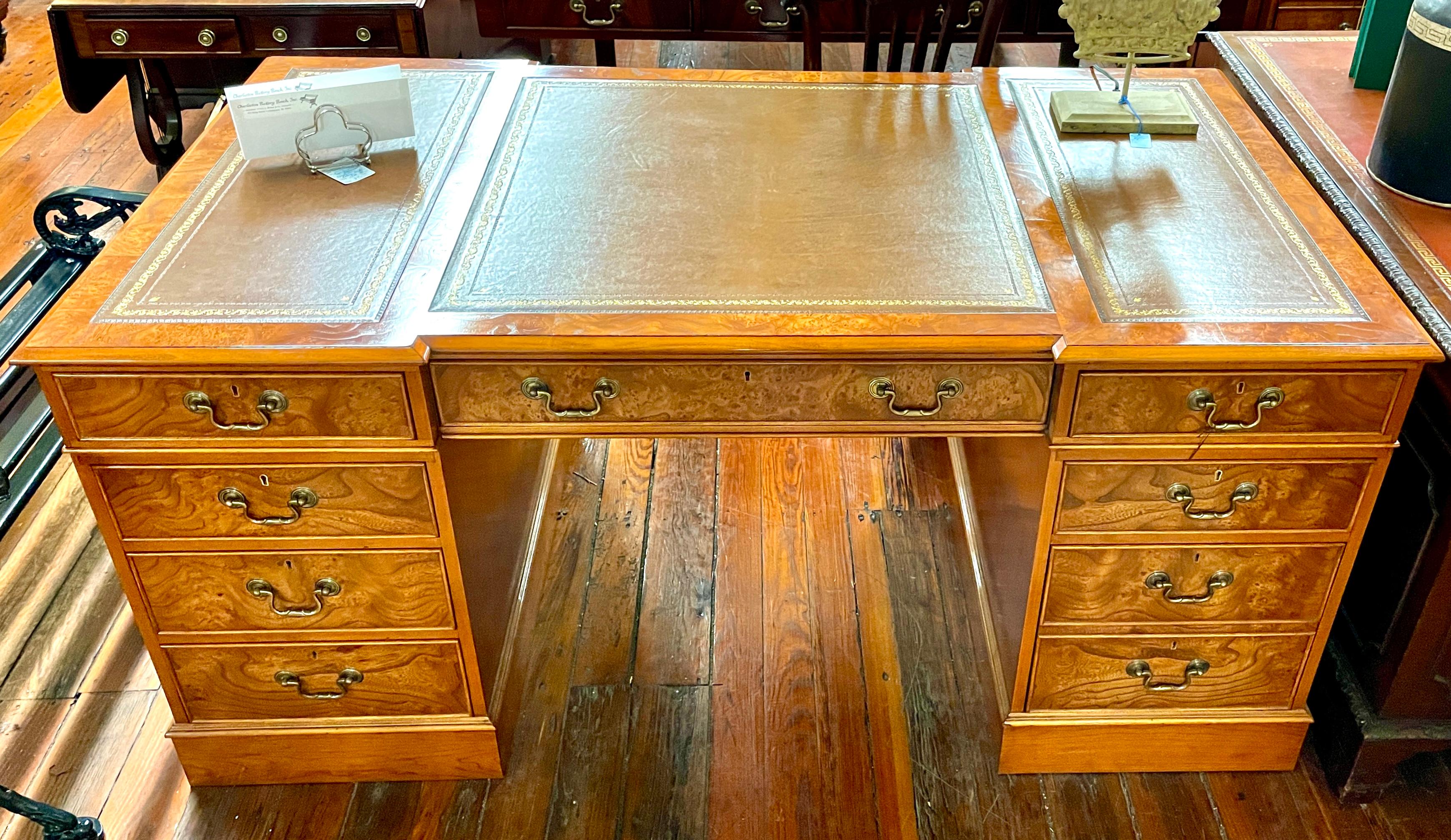 AVAILABLE LATE OCTOBER, 2025

Quite possibly one of the finest British bench-made pedestal partner's desks made today.  From our own proprietary cabinetmakers in the south of England, these desks are made to order in burr elm and inlaid mahogany. 