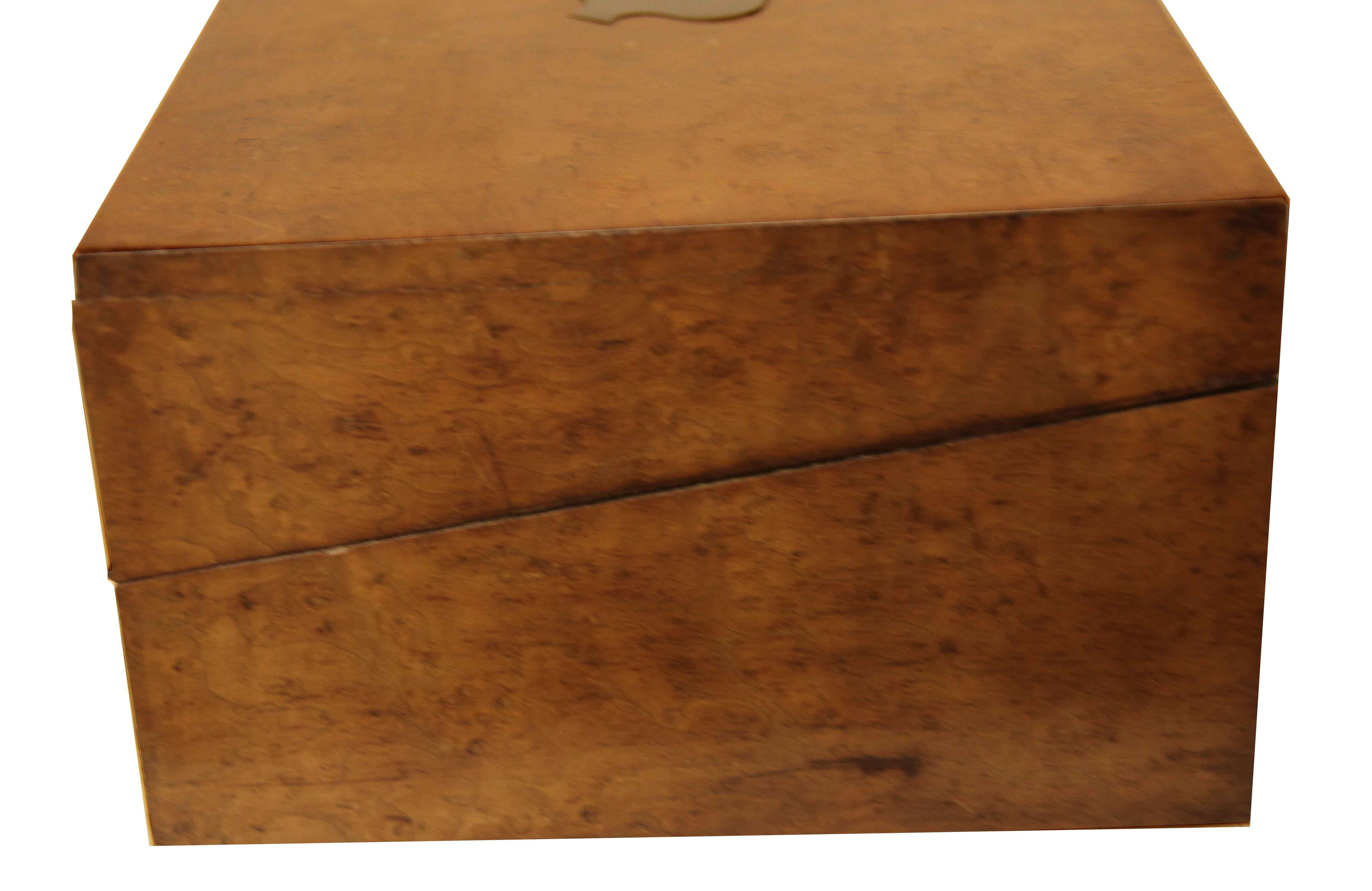 English bird's eye maple lap desk , the entire desk with beautiful color and patina, the top has a shield medallion in the center; the front key hole is inlaid with an interesting diamond shape of beech and ebony; interior with original blue felt