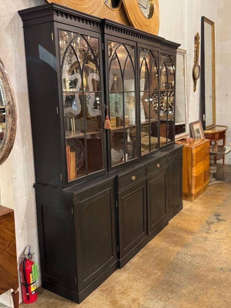 Handsome late 19th century English black painted bookcase. Victorian charm with dramatic presence—a 19th-century English black painted bookcase offers timeless craftsmanship, bold color, and architectural elegance. Circa 1900. 89.5w x 16d x 86h