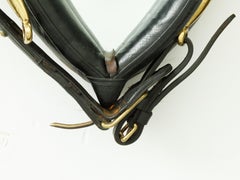 English Black Leather and Brass Horse Collar Wall Mirror, circa 1920