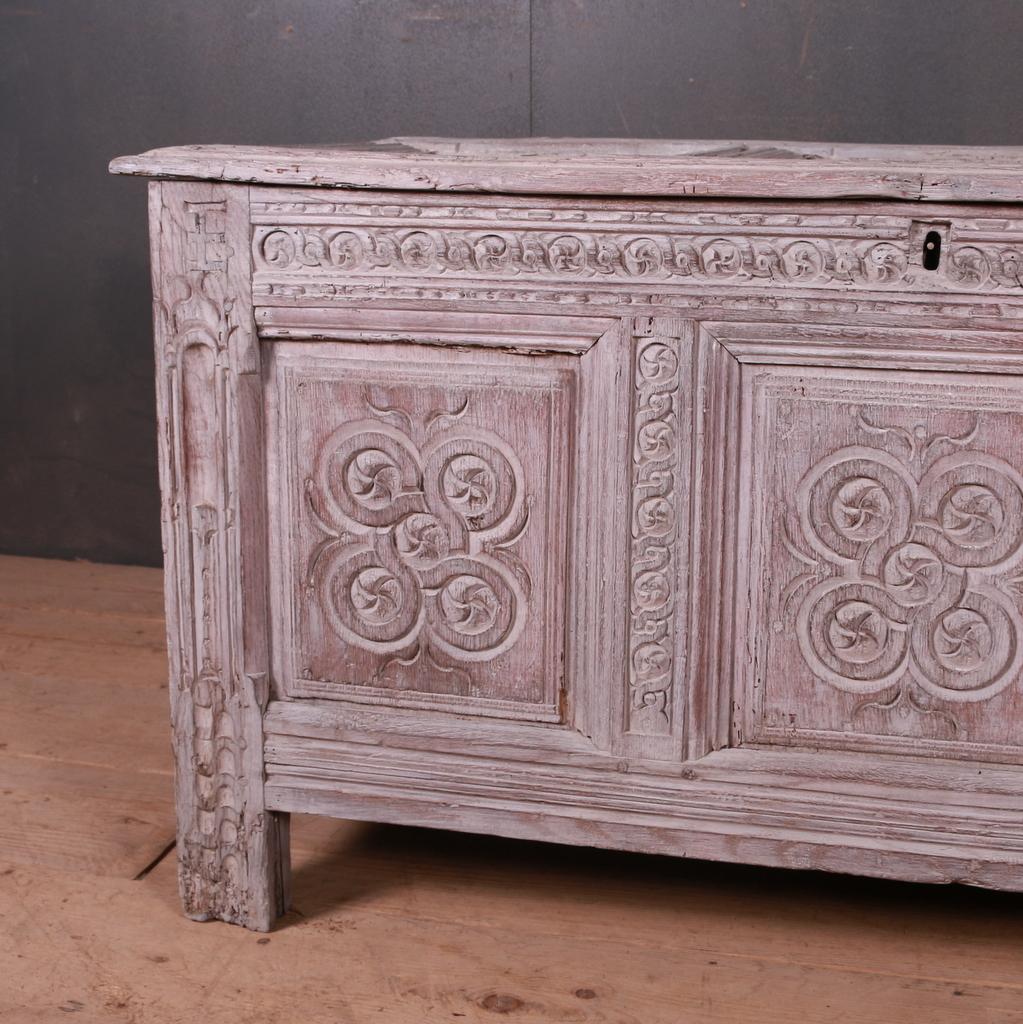 Early 18th century stripped and bleached carved oak coffer, 1720.

Dimensions:
47.5 inches (121 cms) wide
21.5 inches (55 cms) deep
25 inches (64 cms) high.