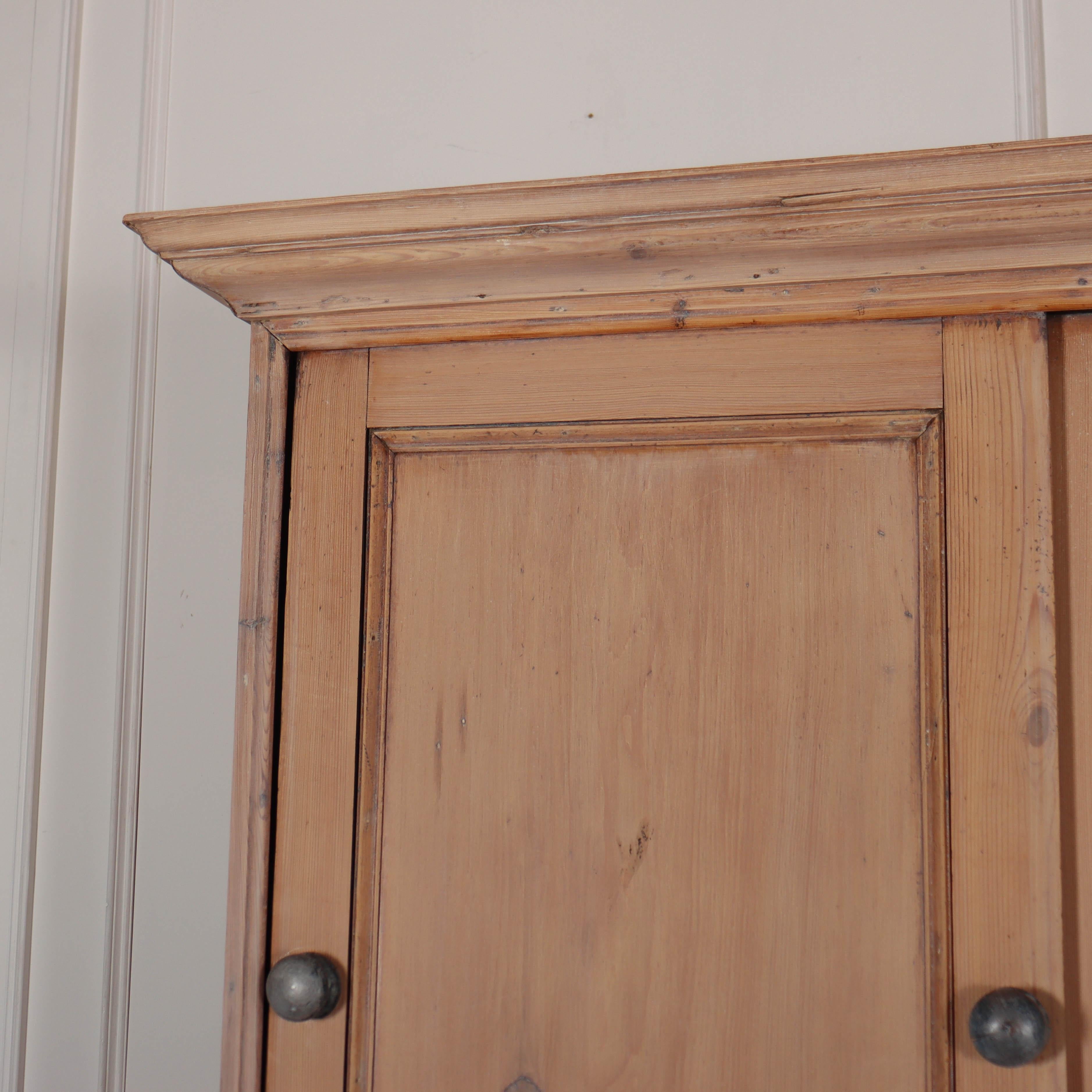 Early 19th C English bleached pine housekeepers cupboard with sliding doors. 1840.

Internal top depth is 12.5