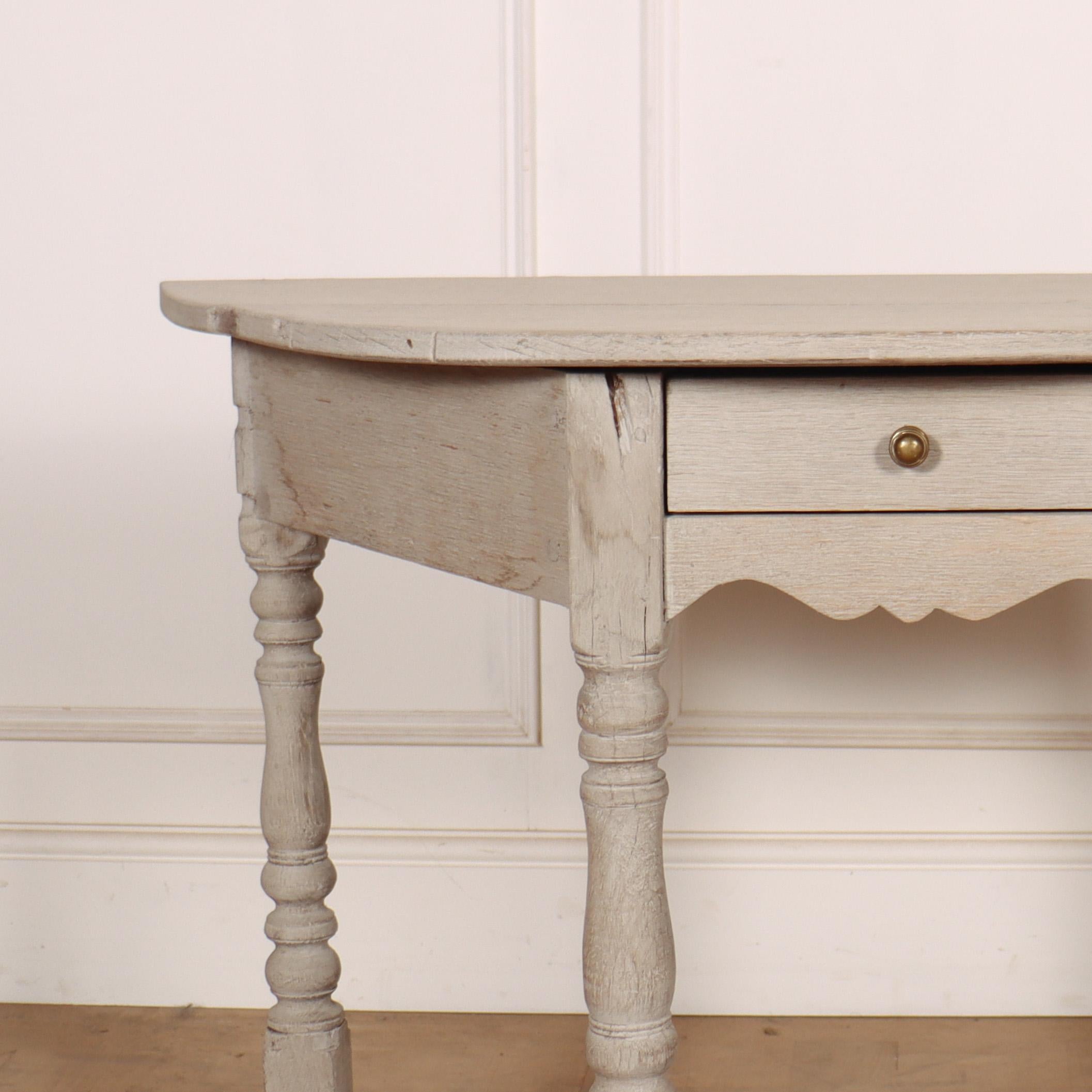English bleached oak one drawer demi-lune console table made from 18th C components. 1800.

Reference: 8061

Dimensions
39 inches (99 cms) Wide
19 inches (48 cms) Deep
28.5 inches (72 cms) High