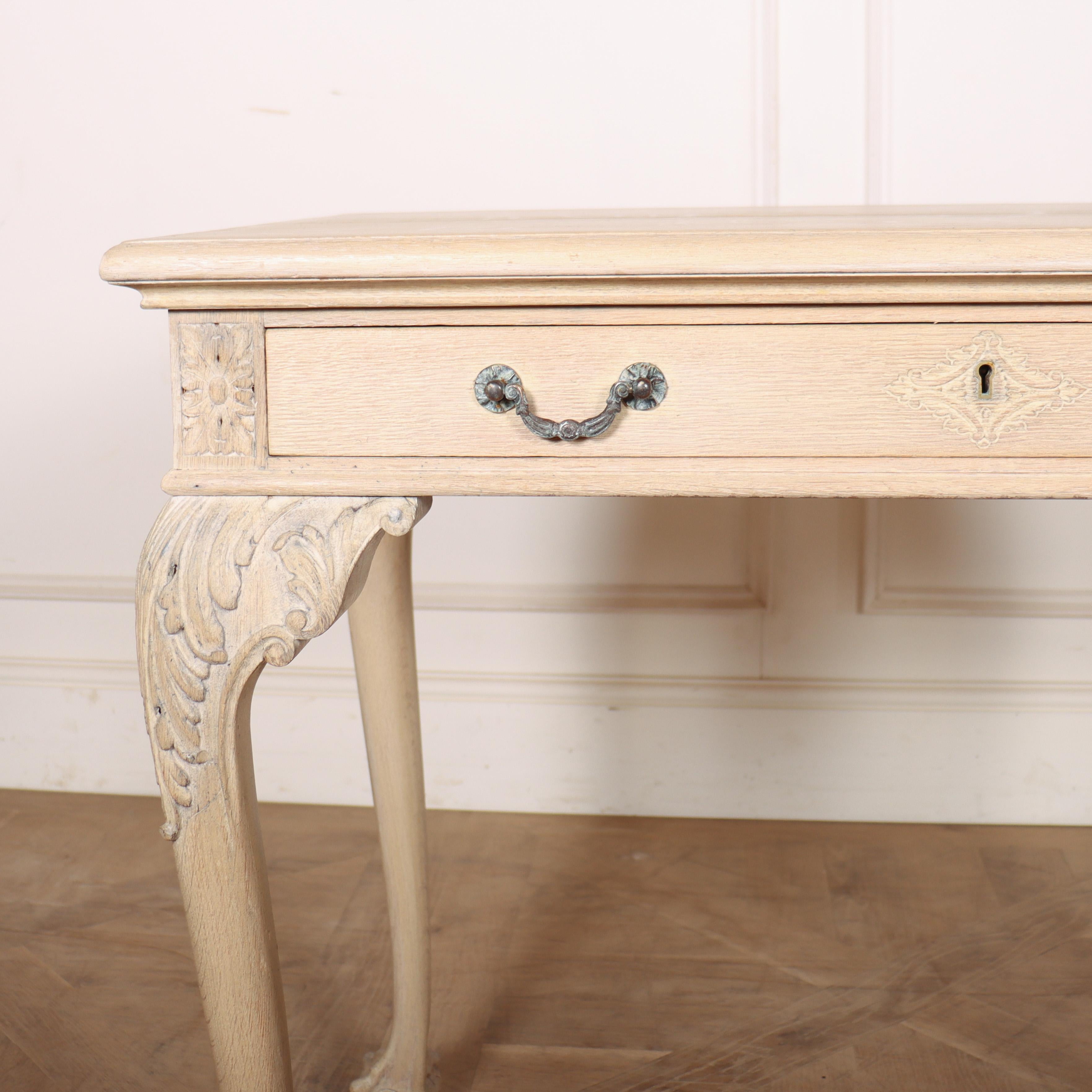 Pretty 19th century English bleached oak one drawer lamp table / writing table with good carved cabriole legs sat on ball and claw feet. 1880.

Code: 8498

Dimensions:
W: 32