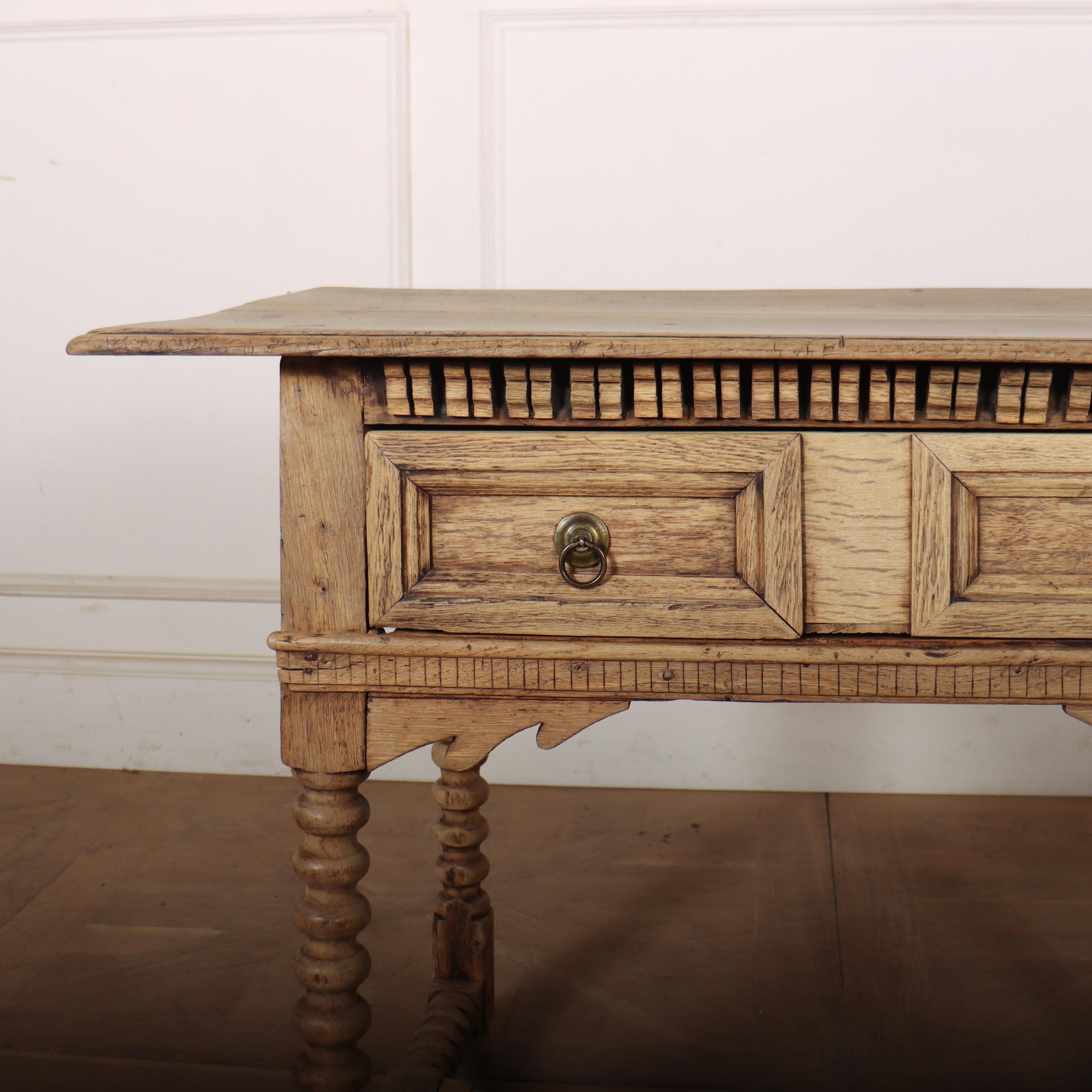 Late 18th century English bleached oak one drawer lamp table with bobbin turned legs. 1780.

Internal reference: C

Code: 8679

Dimensions:
W: 35.5