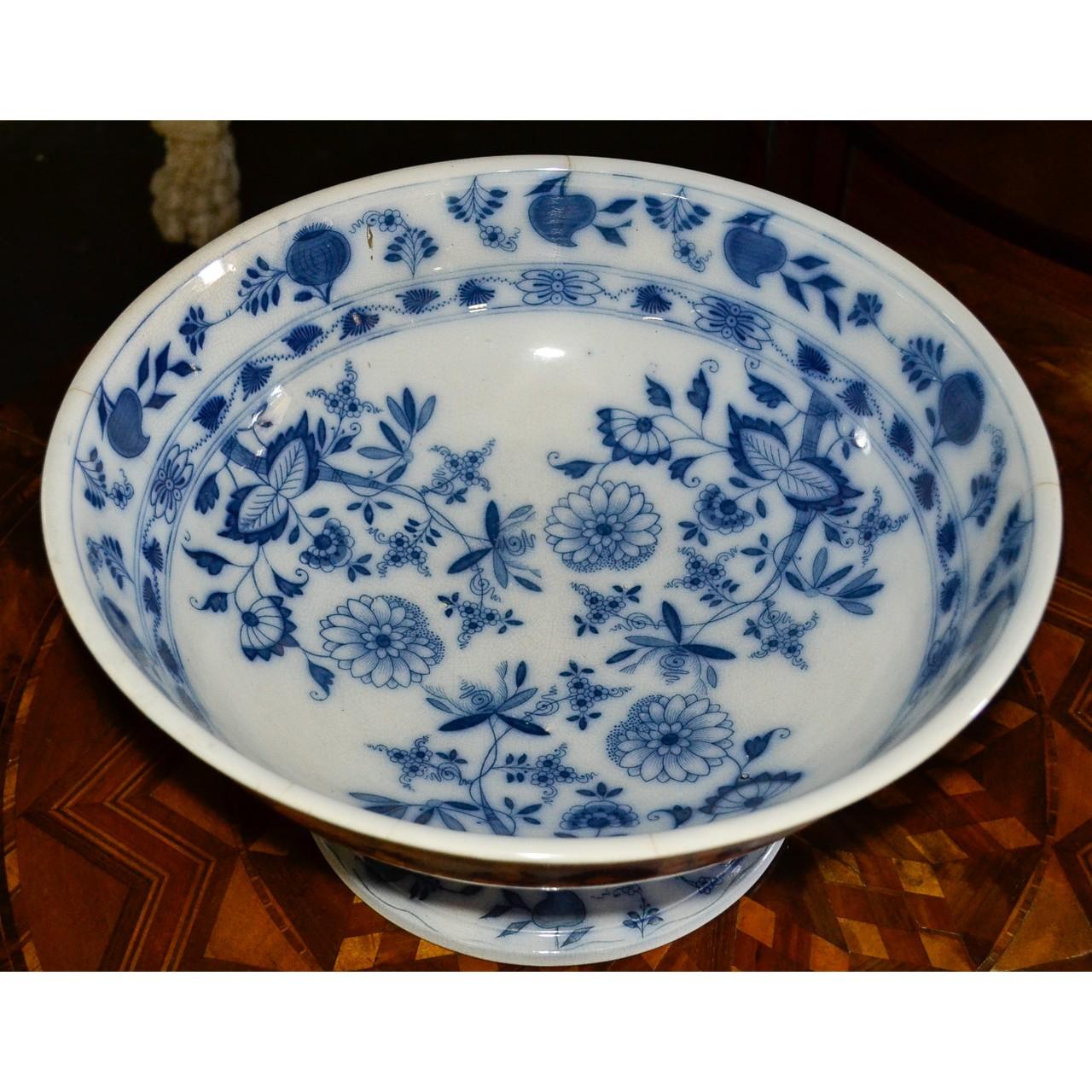 This gorgeous blue and white Dresden collectible bowl was made in England in the early 20th century.
The makers mark is on the bottom of bowl. See last photo for mark.

Measures: 16 inches wide x 8 inches height.