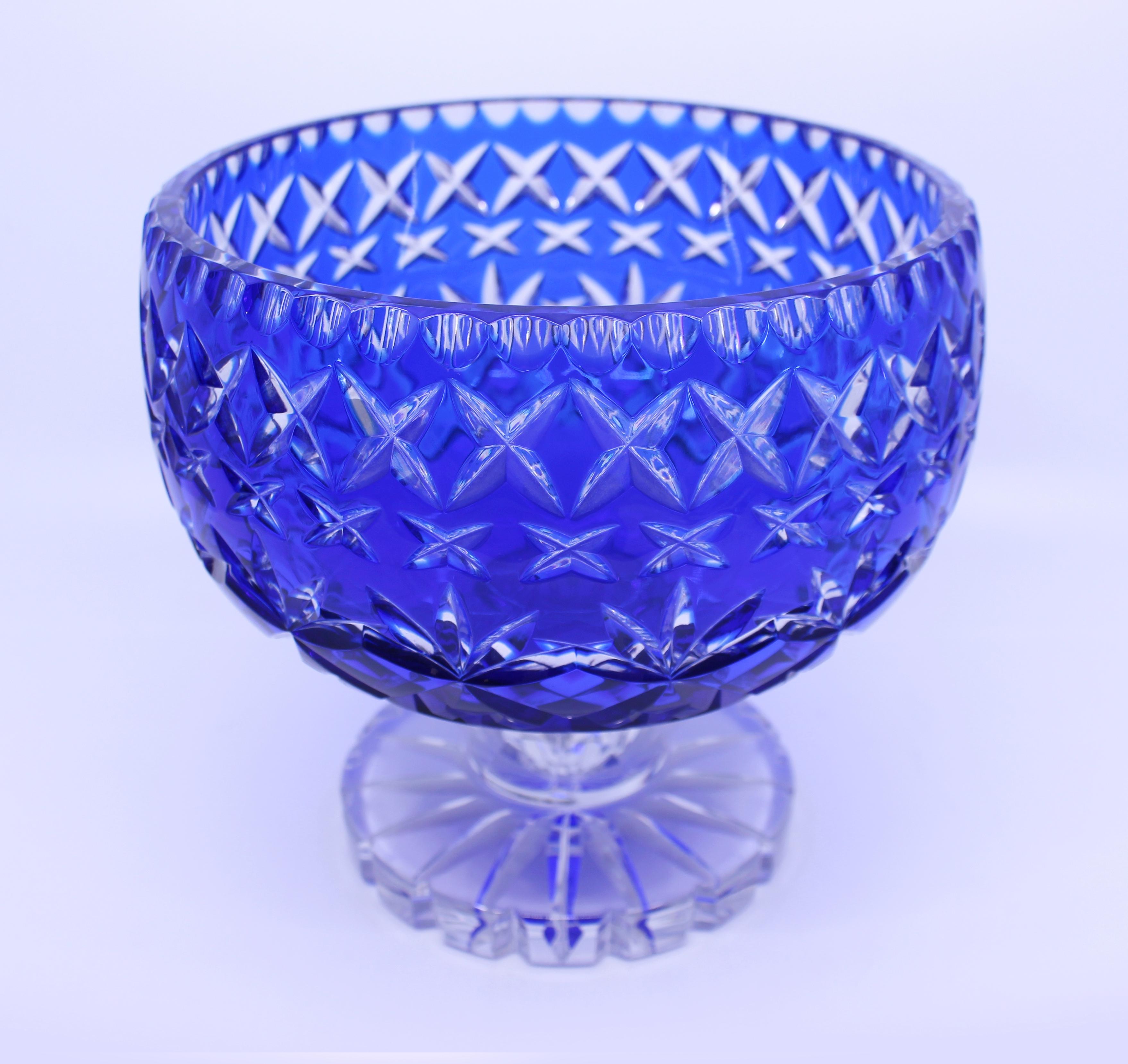 Period 
Mid-20th century.

Origin 
Stourbridge glassworks, England

Composition 
Cut glass overlay crystal, blue

Condition 
Very good condition. No chips, cracks or repairs. A few light scratches to underside commensurate with age
 

