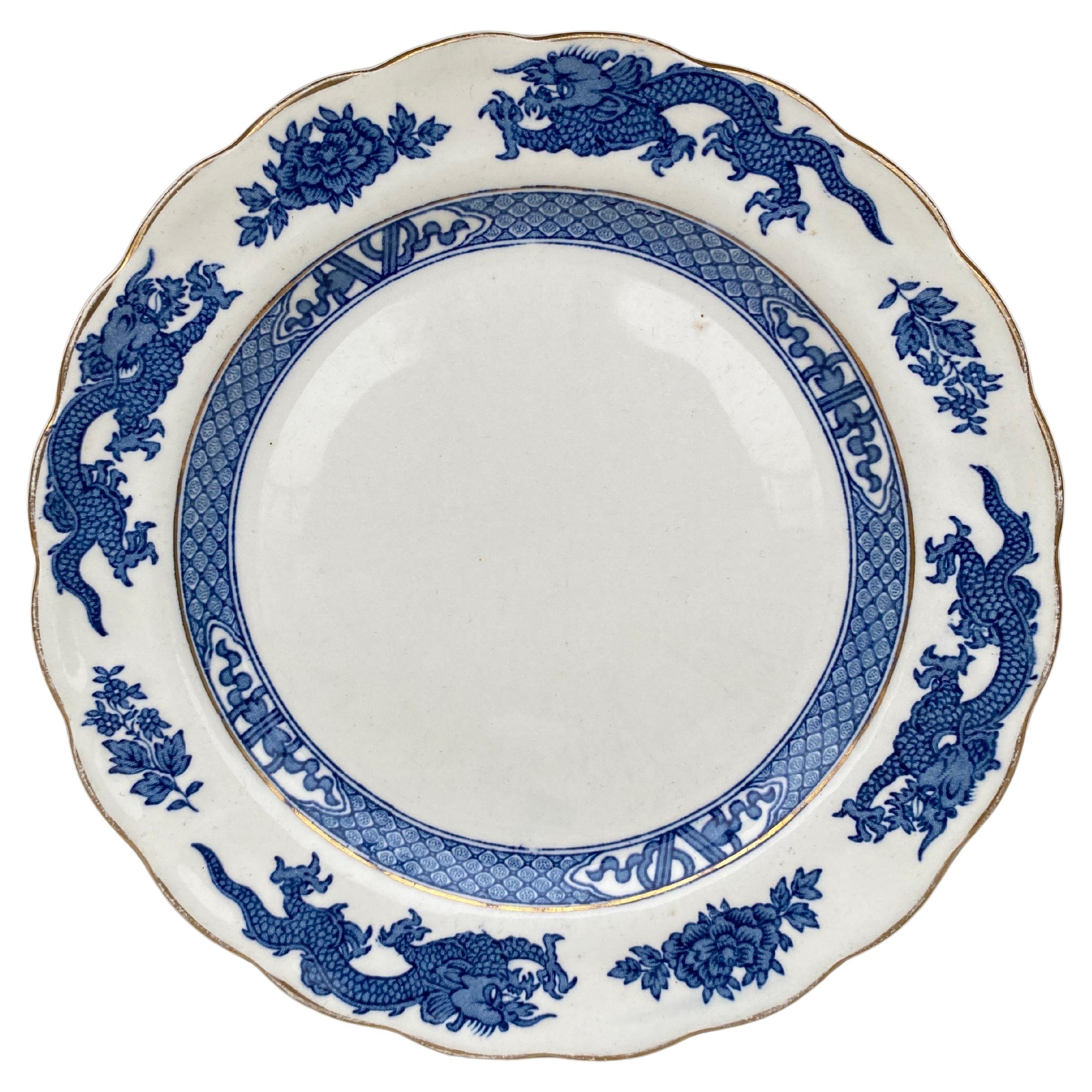 Assiette anglaise au dragon bleu et blanc Circa 1920 en vente