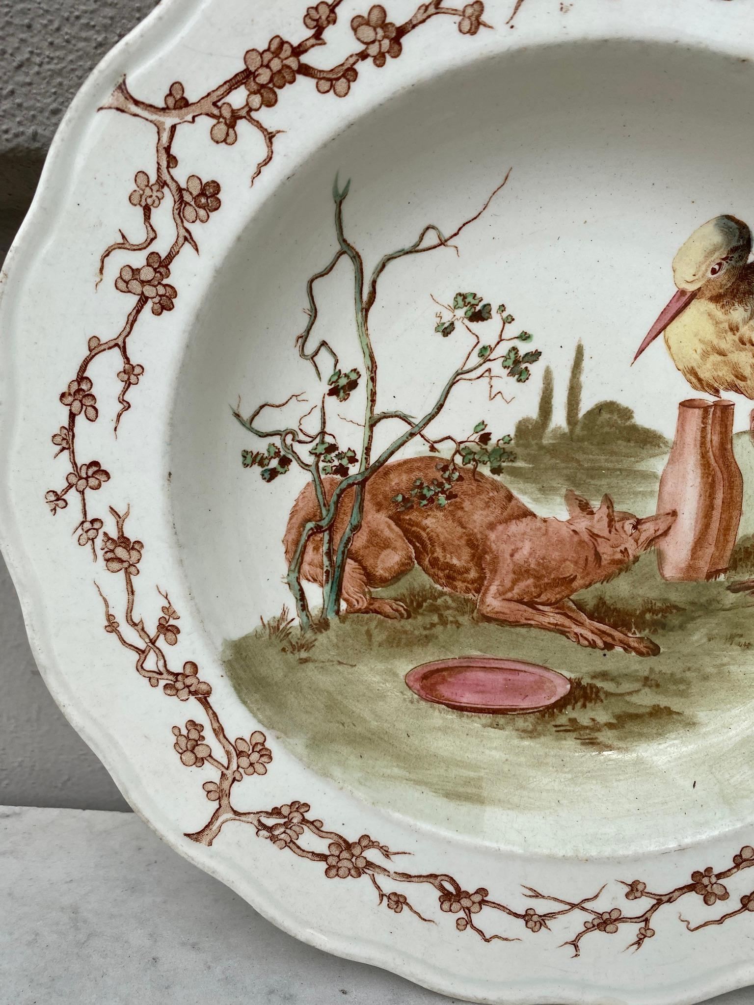 English blue & white plate fox and stork brown Westhead and Moore, circa 1890.
Was sold in the Grand Depot 21 rue Drouot Paris.
Fontaine / Aesops Fables.
English Losange mark.