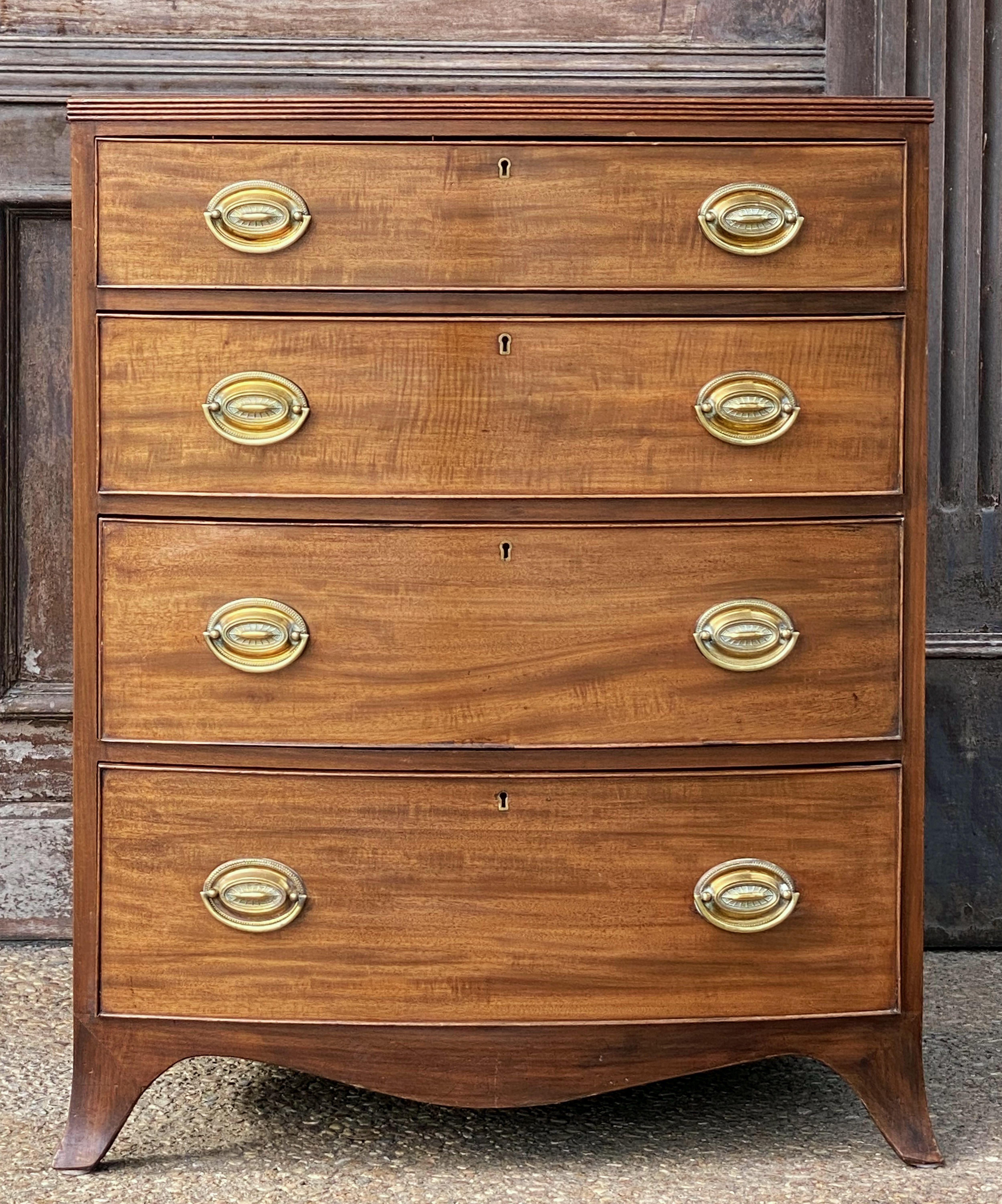 English Bow Front Chest of Flame Cut Mahogany 6