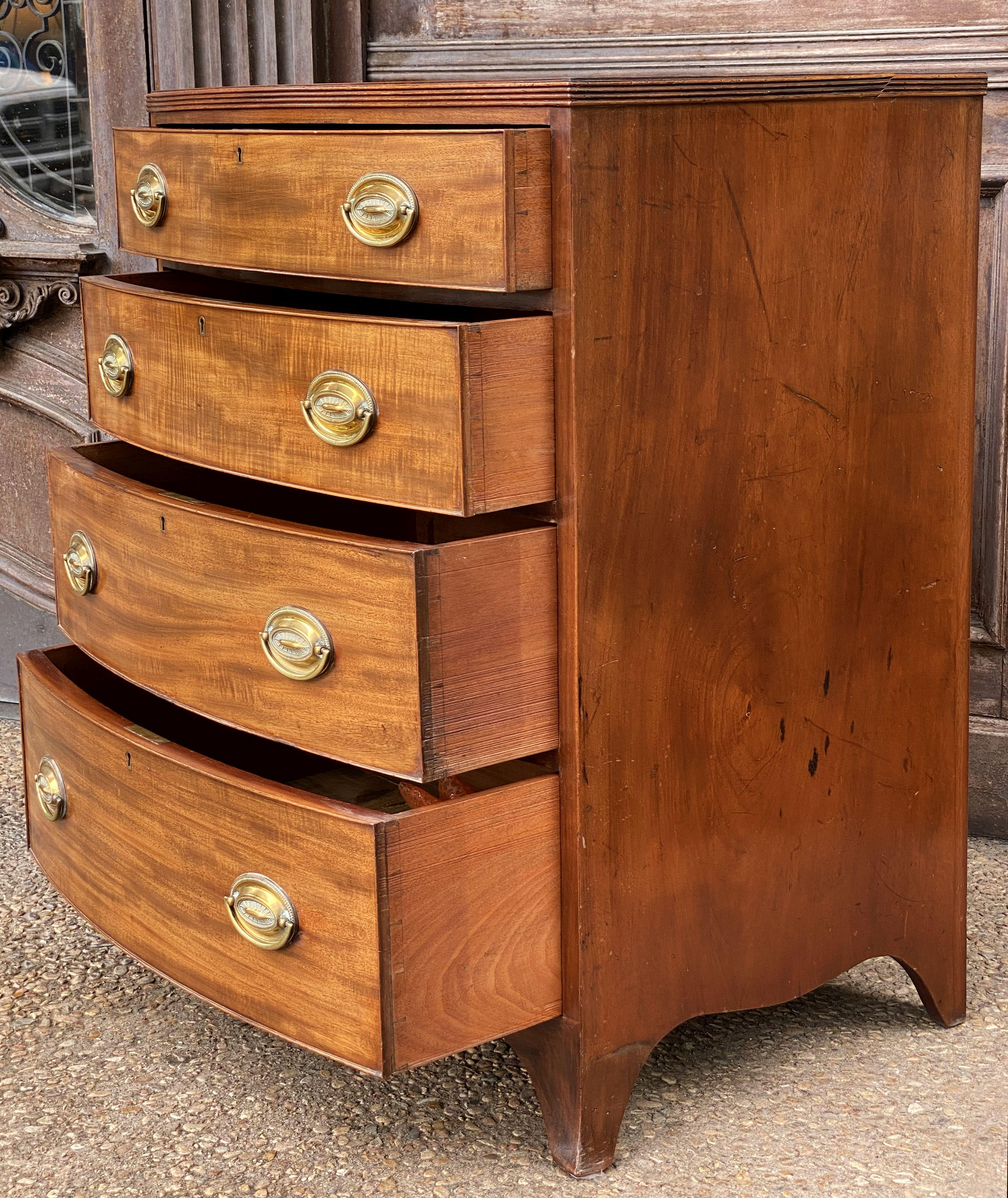 English Bow Front Chest of Flame Cut Mahogany 8