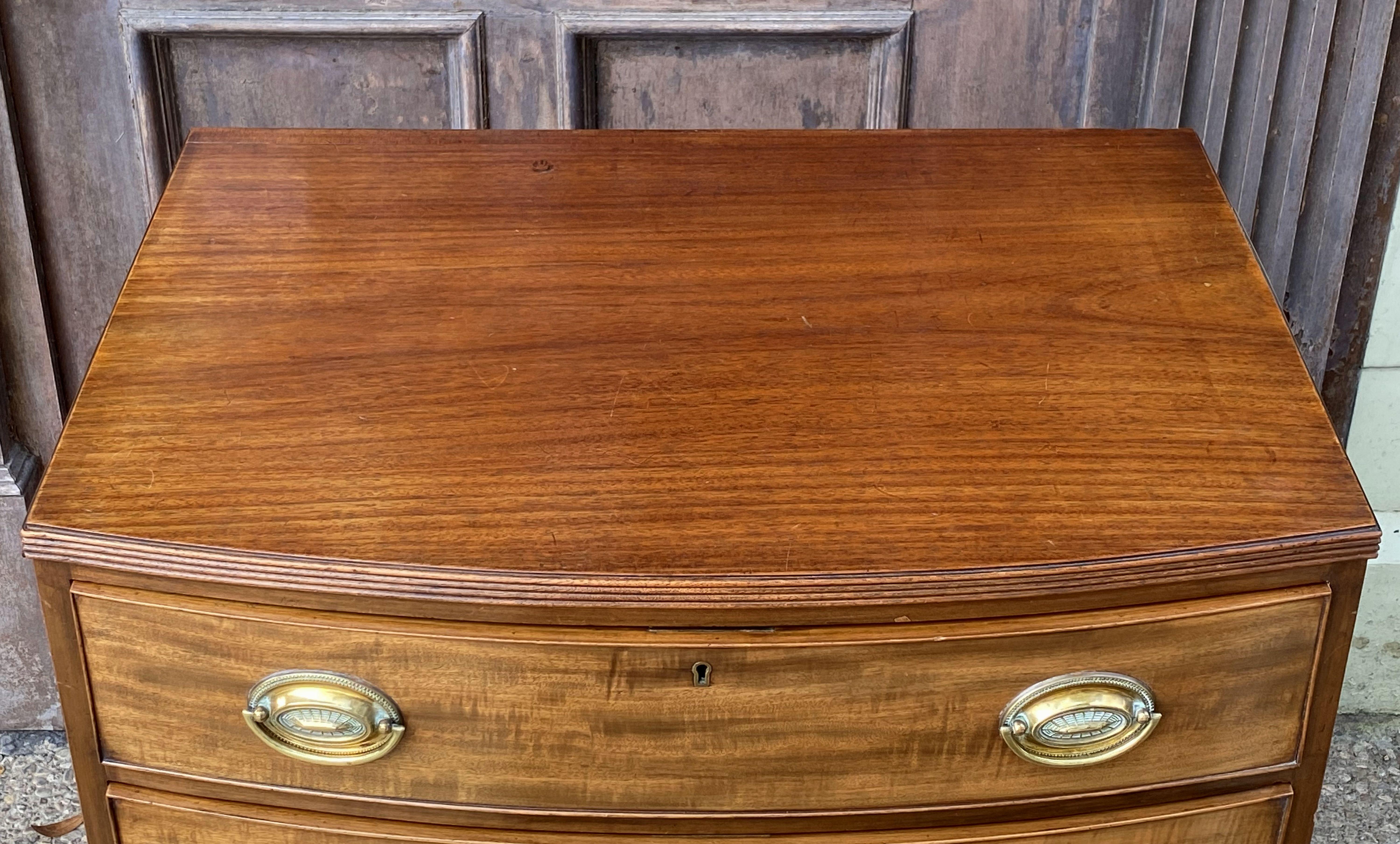 English Bow Front Chest of Flame Cut Mahogany 2