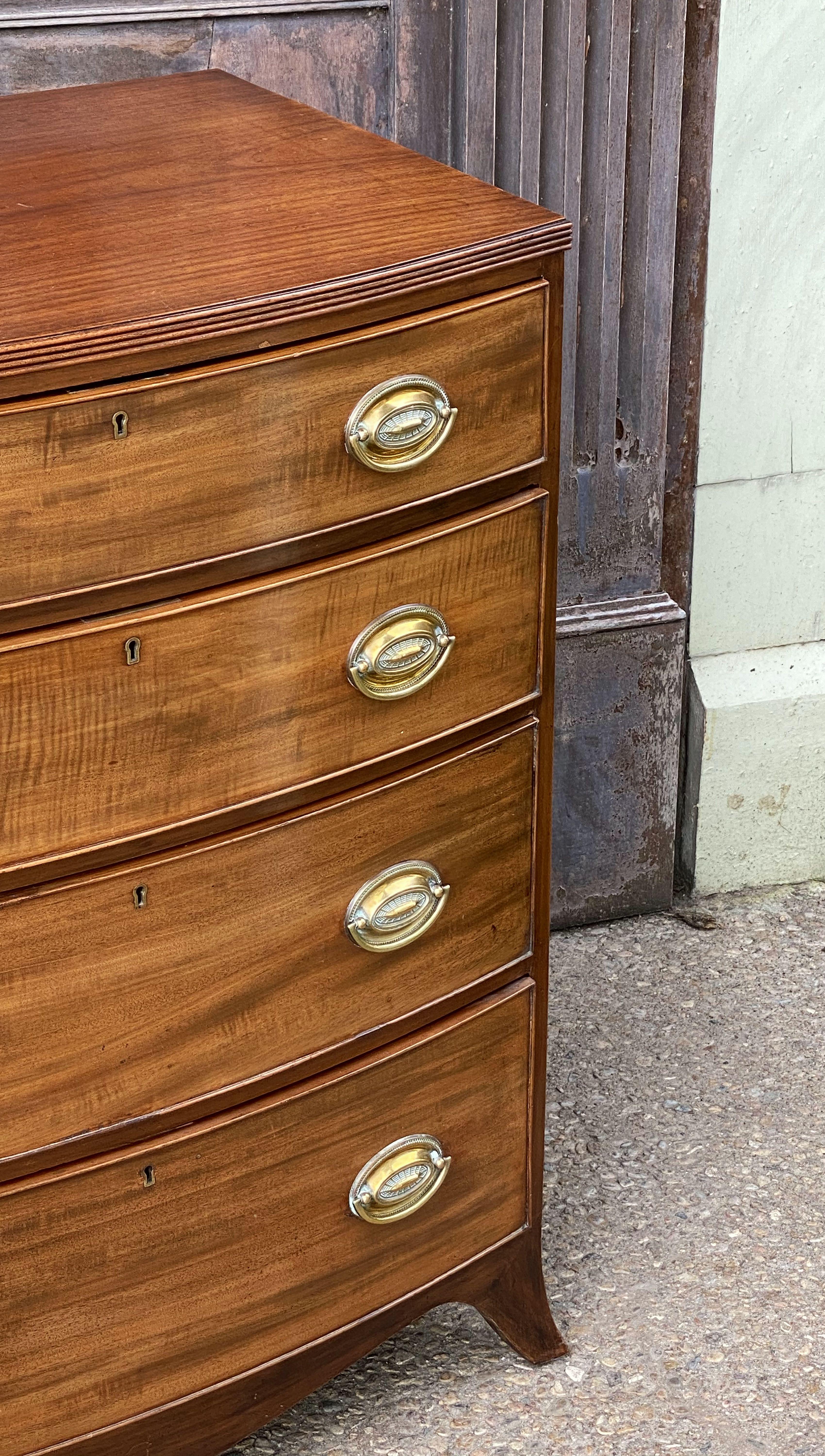 English Bow Front Chest of Flame Cut Mahogany 4