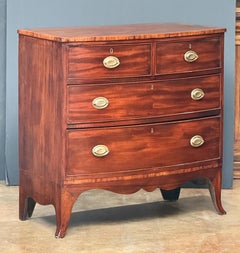 English Bow Front Chest of Inlaid Flame-Cut Mahogany