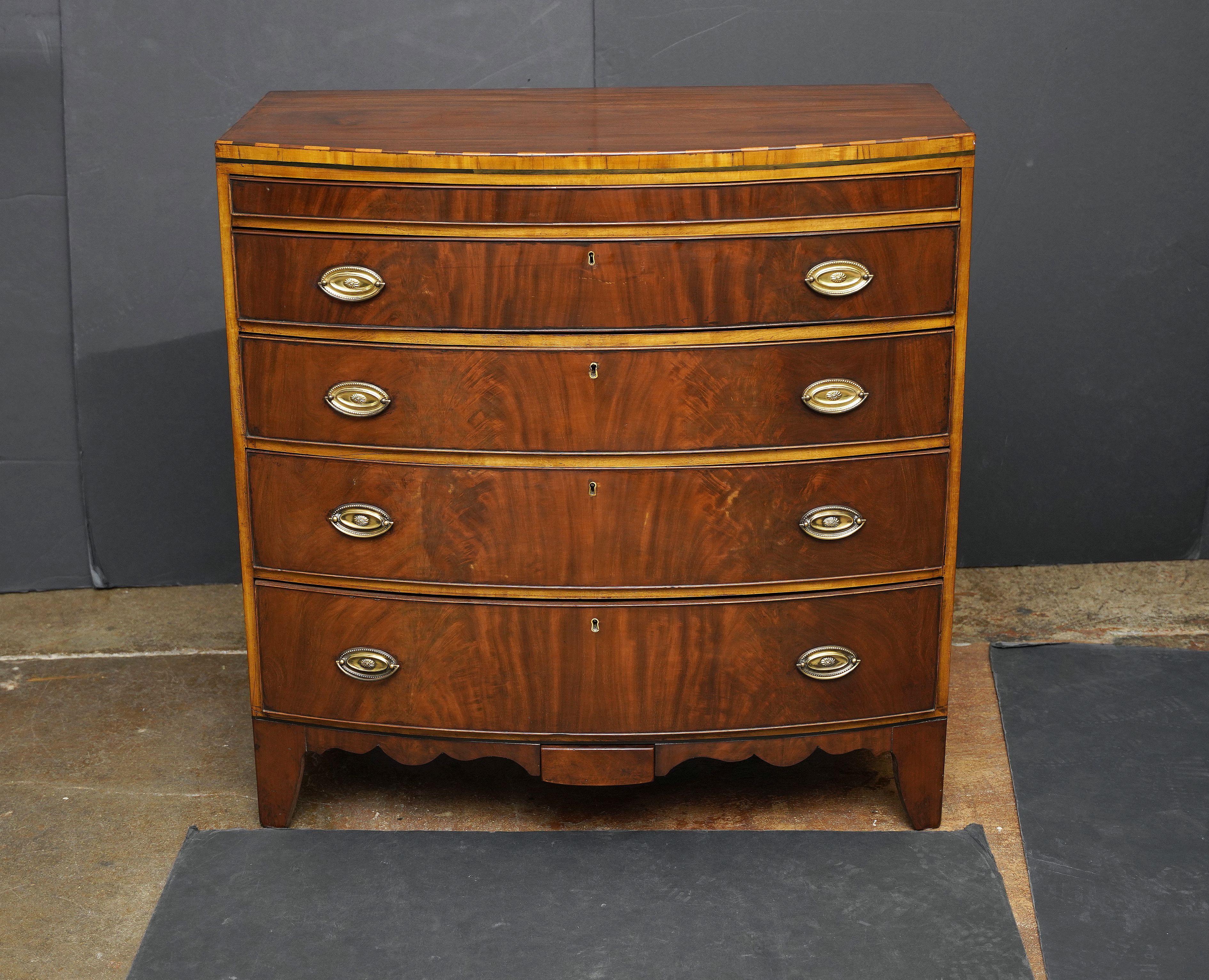 British English Bow Front Chest of Inlaid Mahogany with Secret Drawers For Sale