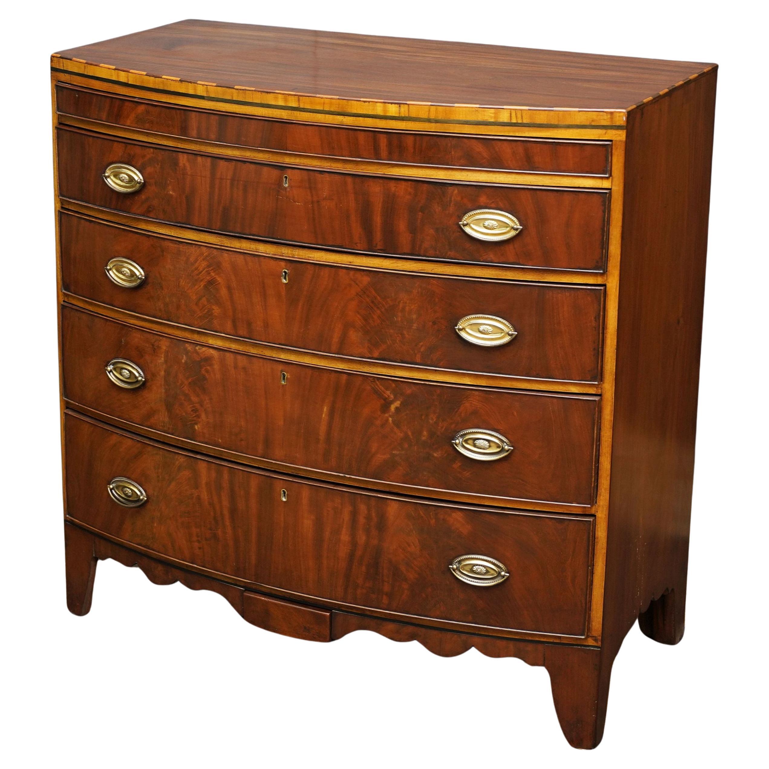 English Bow Front Chest of Inlaid Mahogany with Secret Drawers For Sale