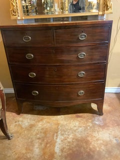English bow front mahogany chest on Bracket feet, five drawer