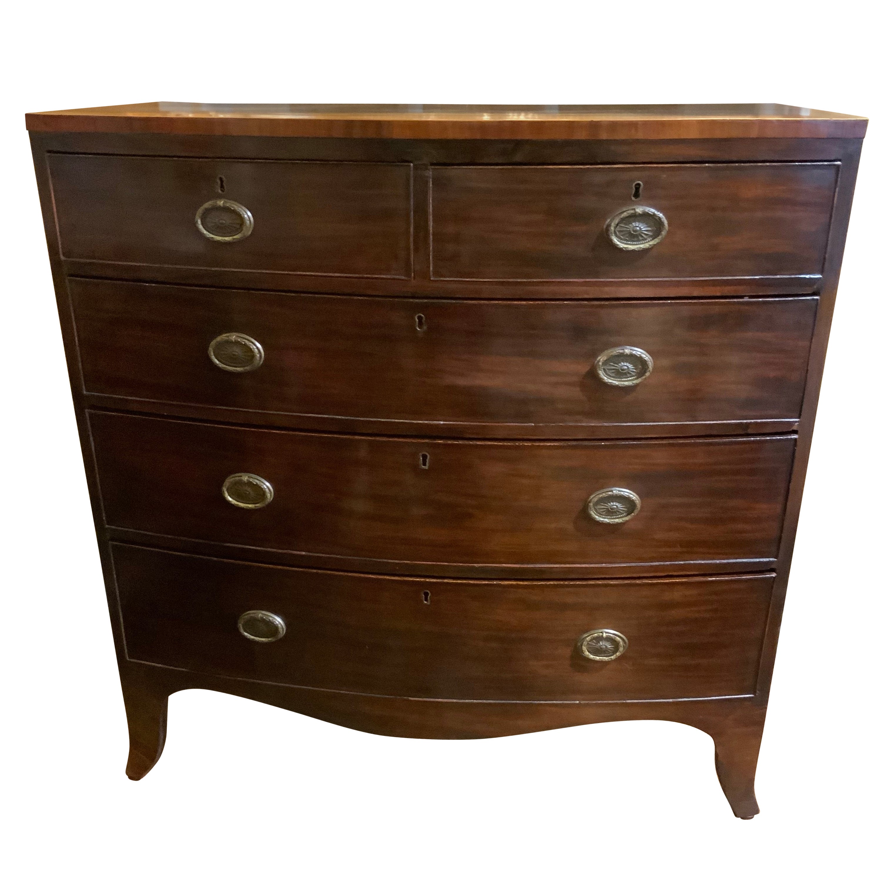 English bow front mahogany chest on Bracket feet, five drawer