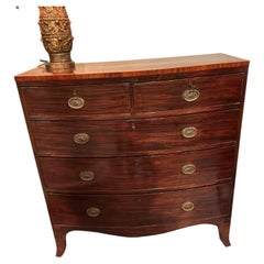 English bow front mahogany chest on Bracket feet, five drawer