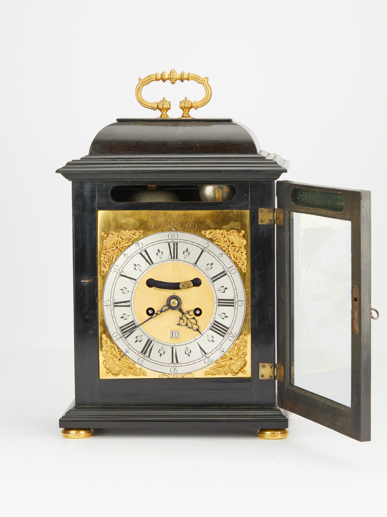 An early English London signed black bracket clock with gilded ornaments and bun feet’s signed PETER GARON circa 1690. The handsome good looking clock with attractive dial with date indication silvered chapter ring blue steeled hands very strong big