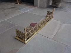 English Brass Gallery Foliage Fire Place Fender with Flanking Finials. C. 1820