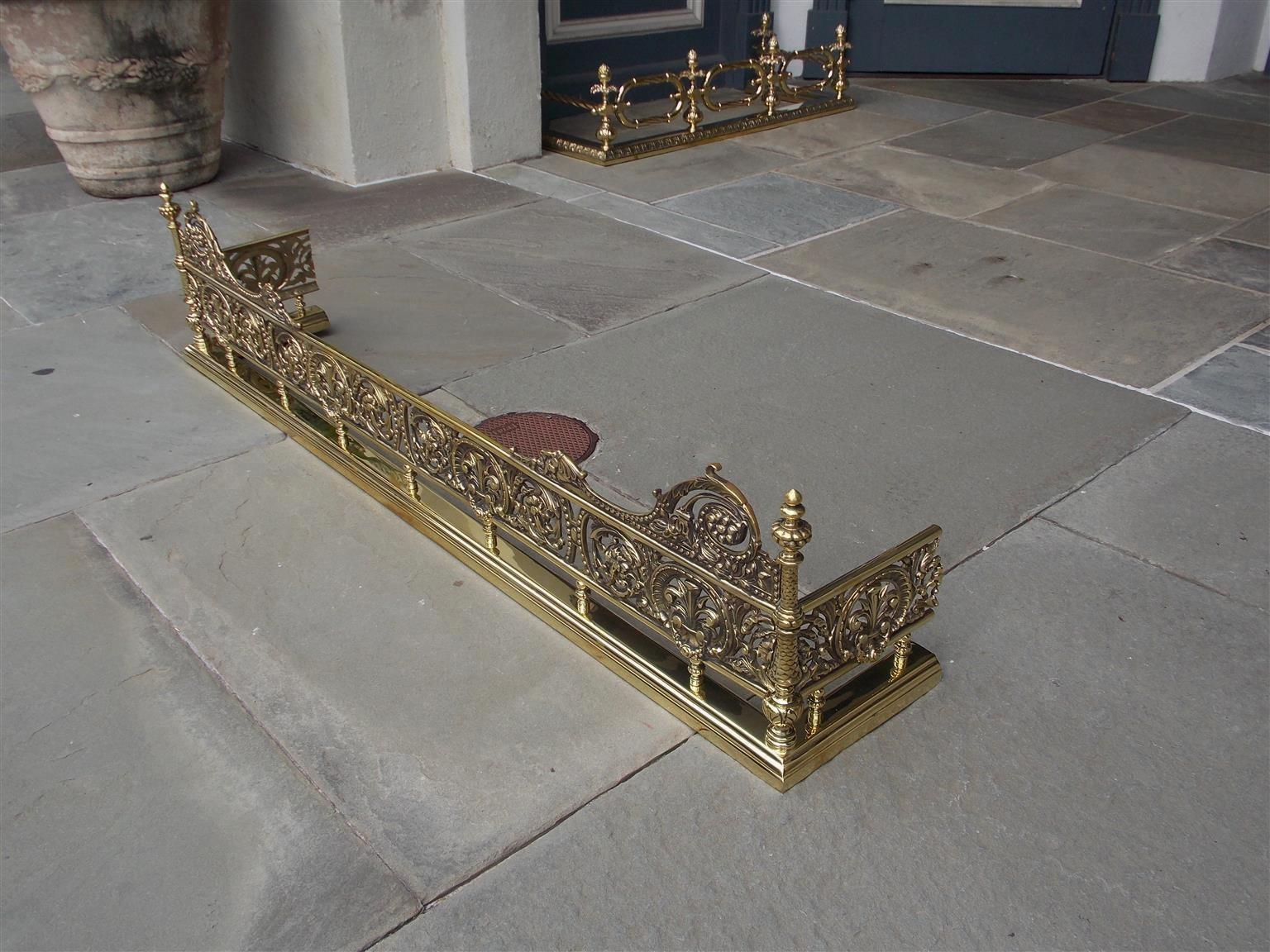 George III English Brass Gallery Foliage Fire Place Fender with Flanking Finials. C. 1820 For Sale