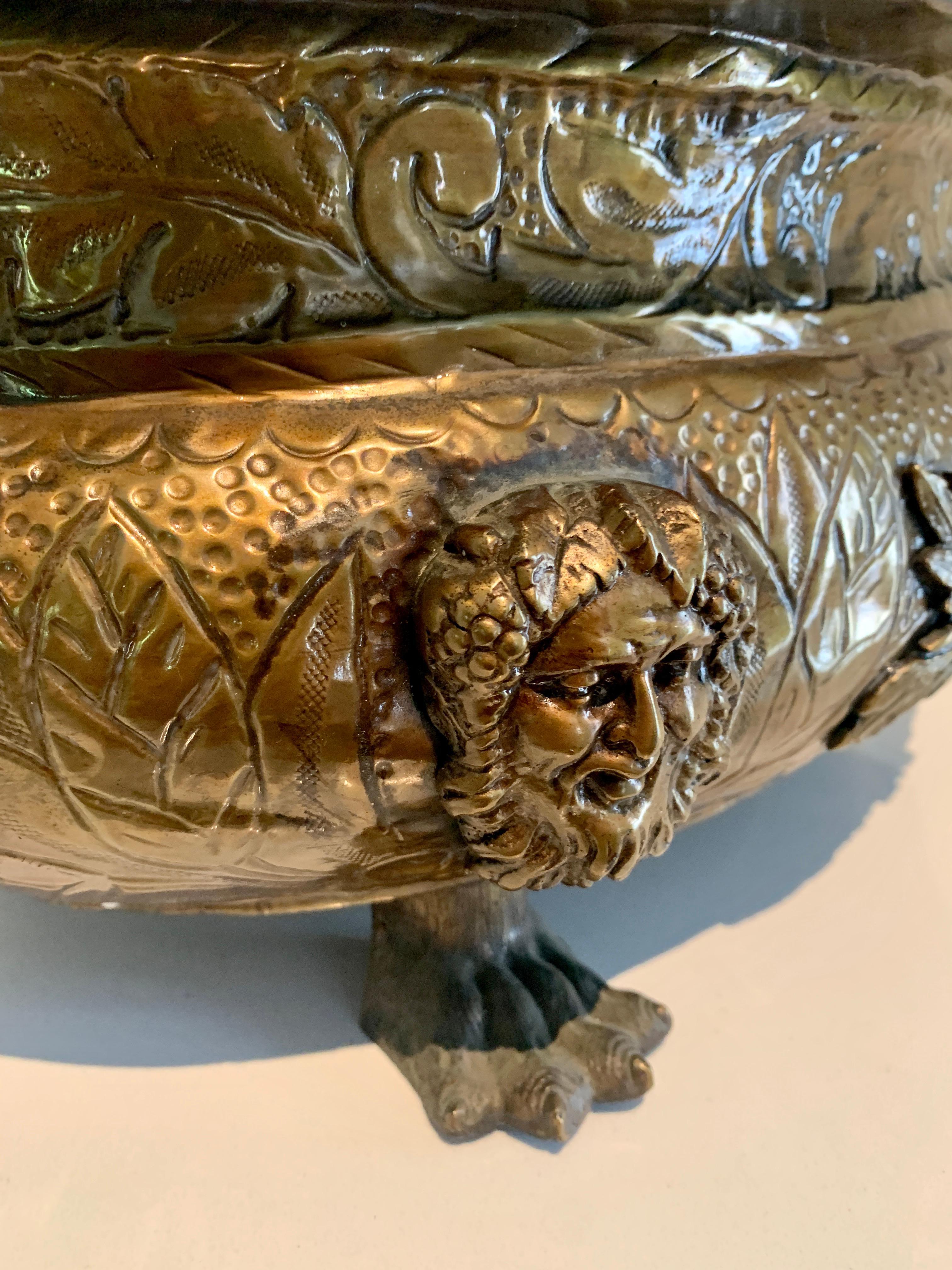 Repoussé English Brass Jardiniere with Lions Heads, Rings and Paw Feet Details For Sale