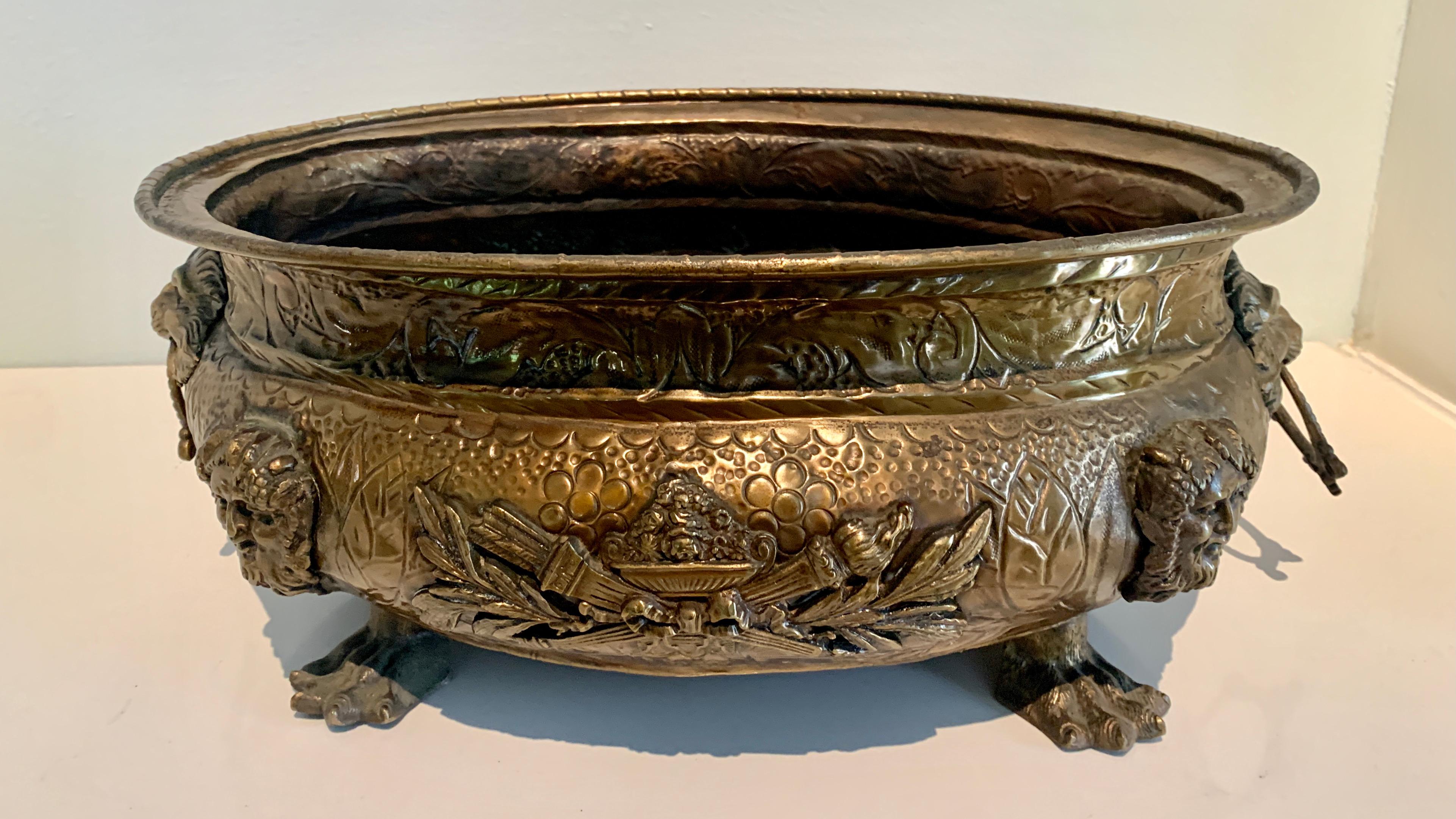 19th Century English Brass Jardiniere with Lions Heads, Rings and Paw Feet Details