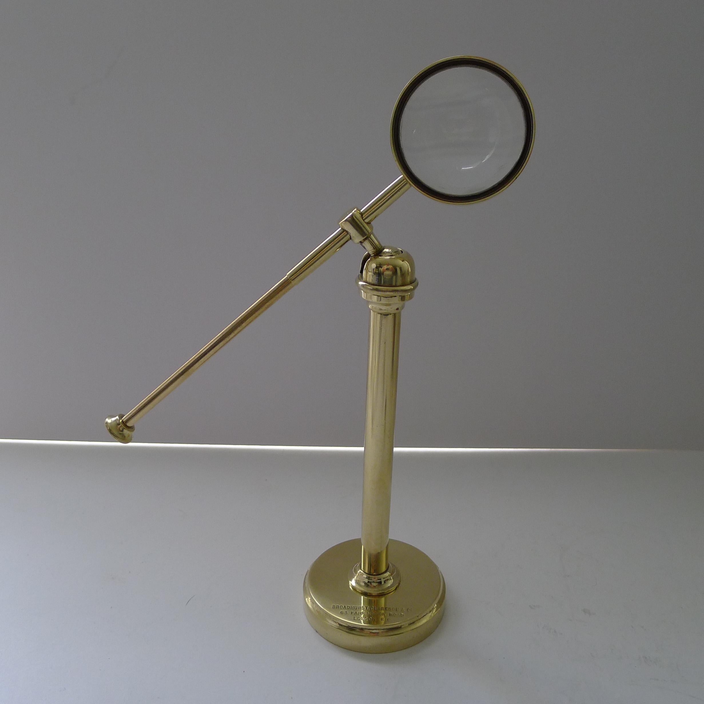British English Brass Pivoting Magnifying Glass on Stand c.1915 - Signed For Sale