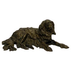 Used English bronze recumbent Spaniel, c. 1840.