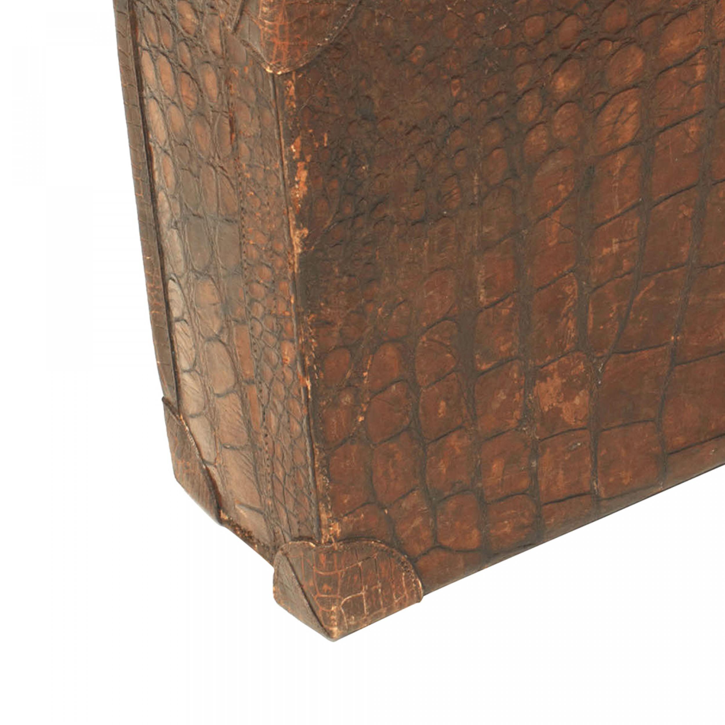 English dark brown crocodile valise with brass latches.