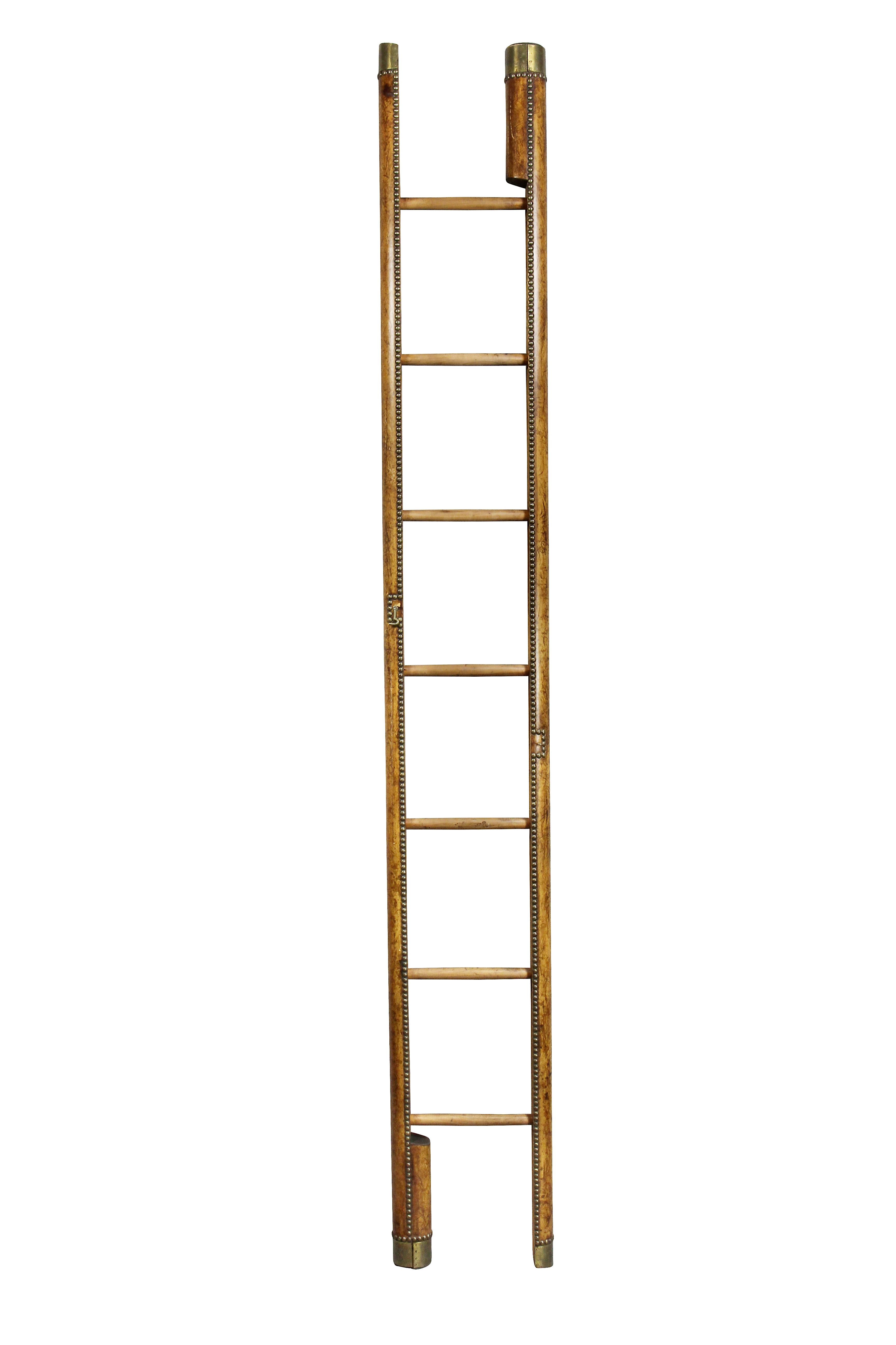 When closed looks like a pole but opens to a ladder. Wood frame covered in leather. Steps are wood.