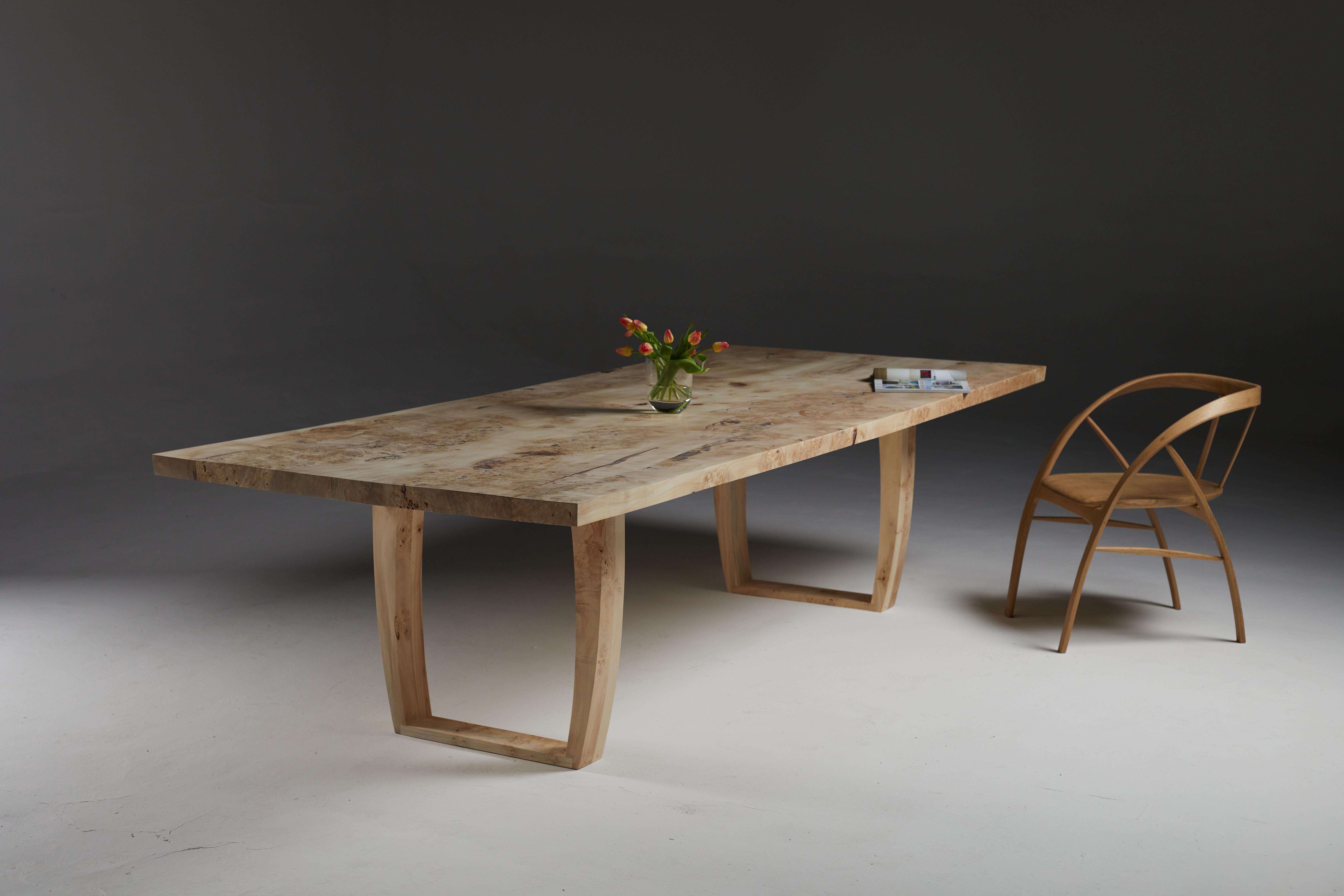 The dining table of solid burr horse chestnut is a unique piece made from horse chestnut that came from a tree that once stood in the village of Tetford in Lincolnshire (Robin Hood's county).
The solid tabletop is made from two slabs of burr horse