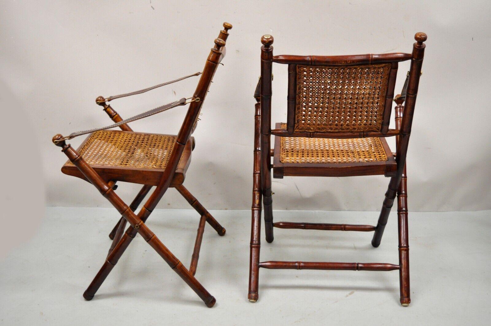 English Campaign Carved Wood Bamboo Folding Sling Arm Chairs with Cane - a Pair In Good Condition In Philadelphia, PA