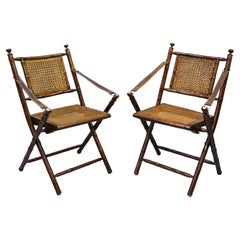 English Campaign Carved Wood Bamboo Folding Sling Arm Chairs with Cane - a Pair