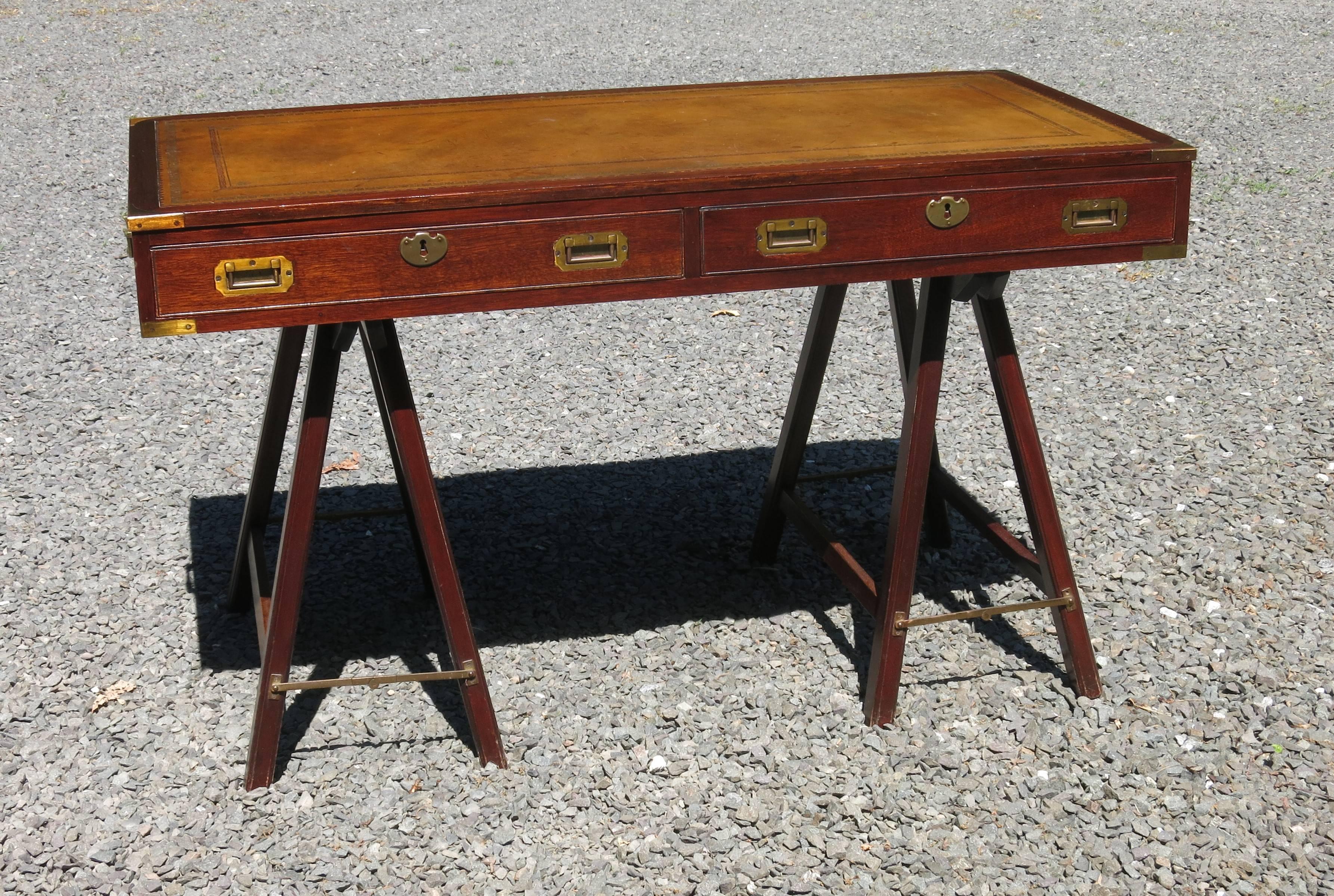 Vintage English campaign desk from the 1950s. It is 51