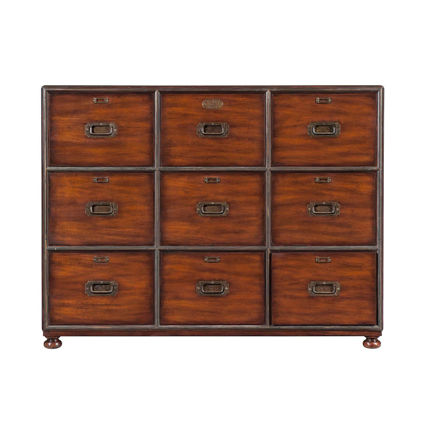 An English Campaign style and brass filing chest of drawers, with nine drawers, on bun feet. Suitable for A4 and Letter Hanging Folders.

Dimensions: 51