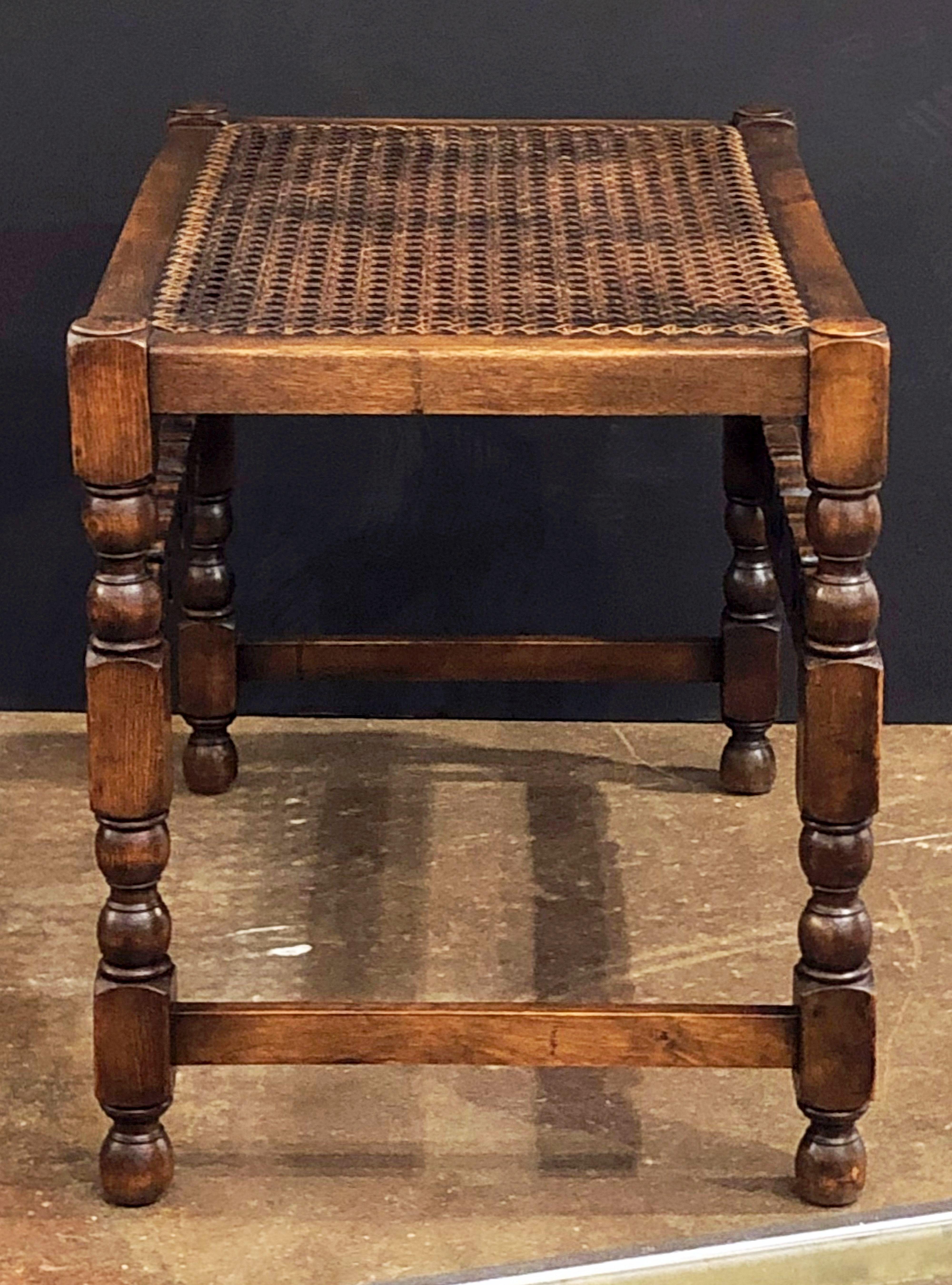 English Caned Bergere Seat or Bench with Carved Wood Stretcher In Good Condition In Austin, TX